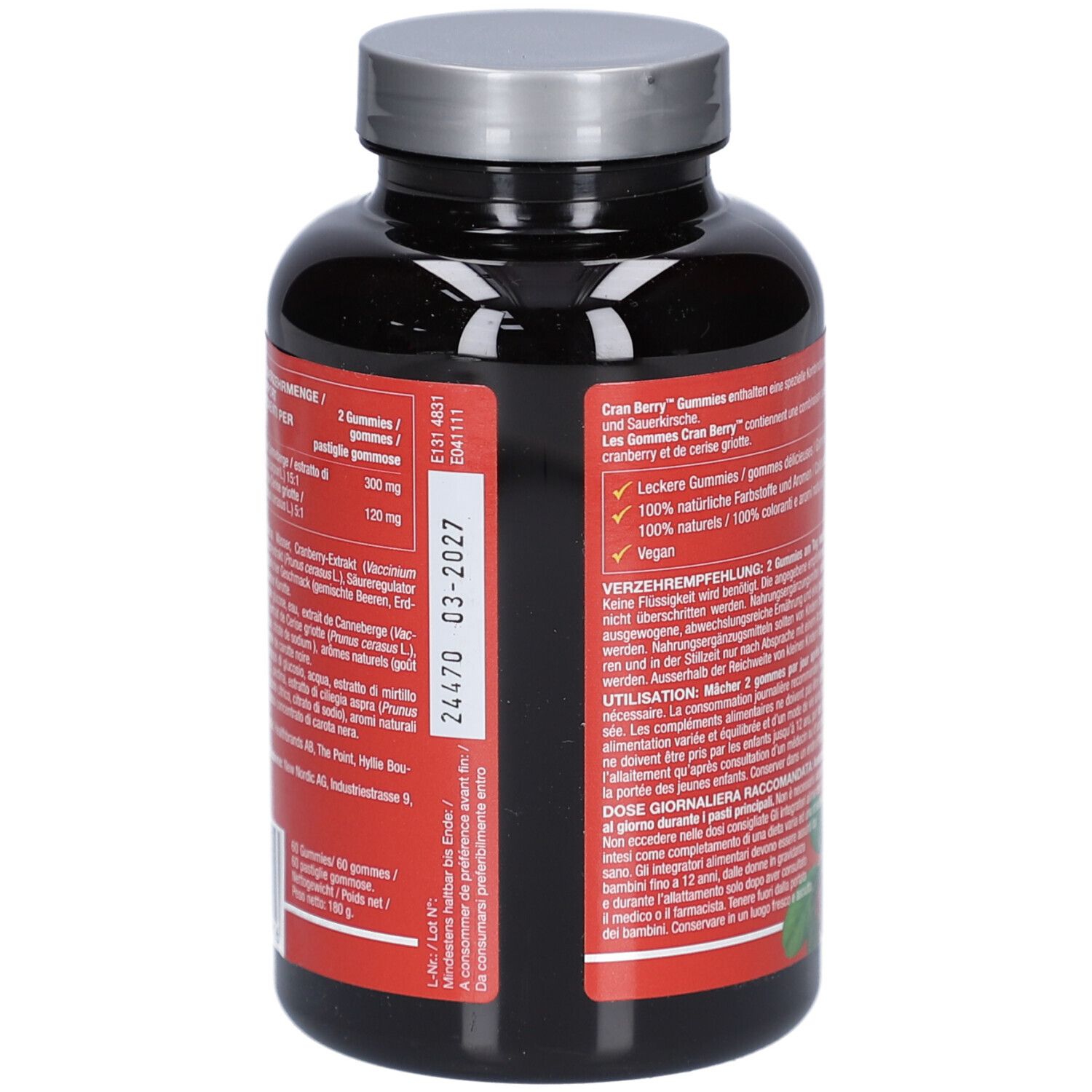 Dos du flacon. Informations textuelles. Logo végan. Date de péremption. Fond noir.