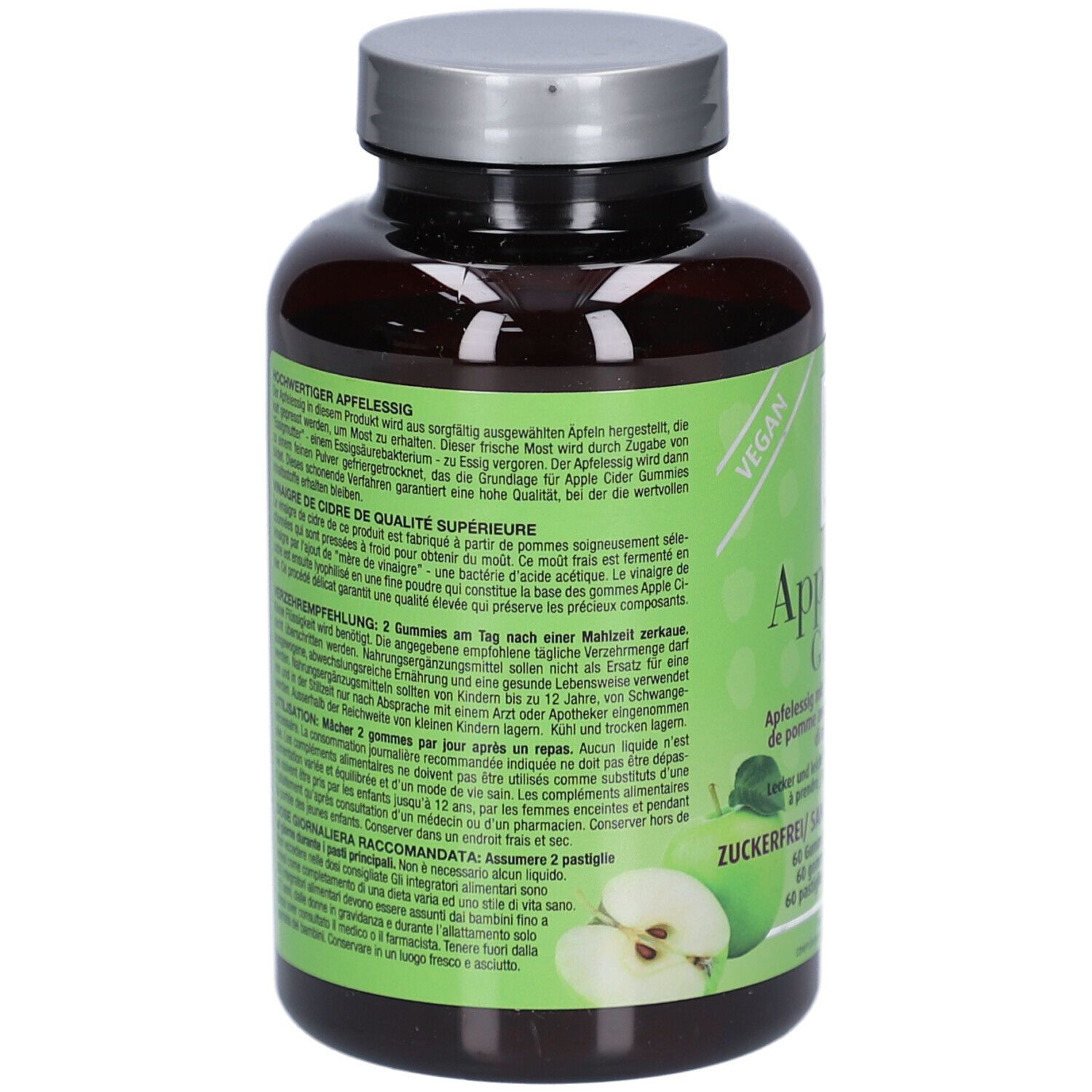 Rückseite der Flasche. Grünes Etikett mit Text. Vegan-Siegel. Apfel-Illustration. Text in Deutsch, Französisch und Italienisch.