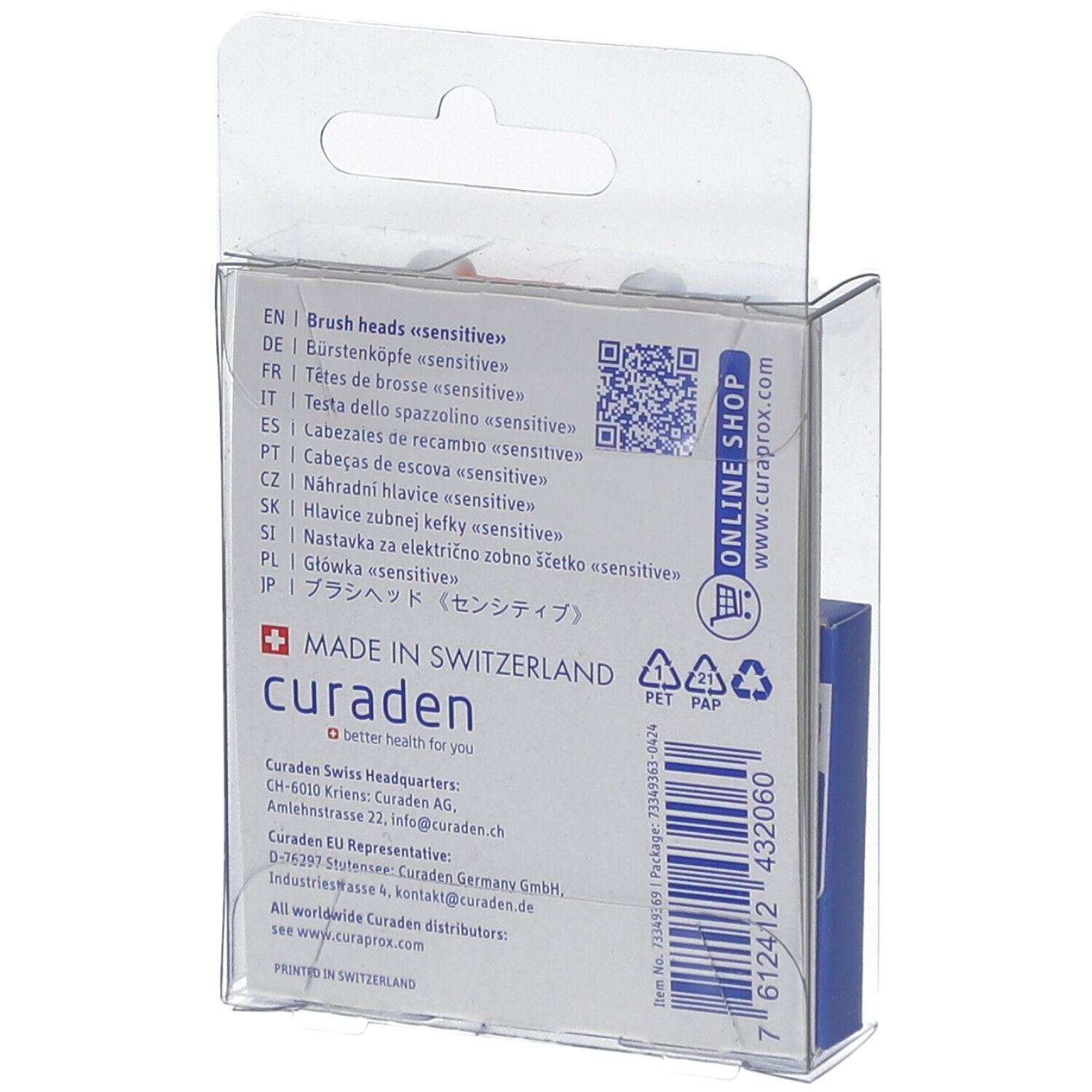 Rückseite der Verpackung mit Text in mehreren Sprachen. QR-Code und Logo. Hergestellt in der Schweiz.