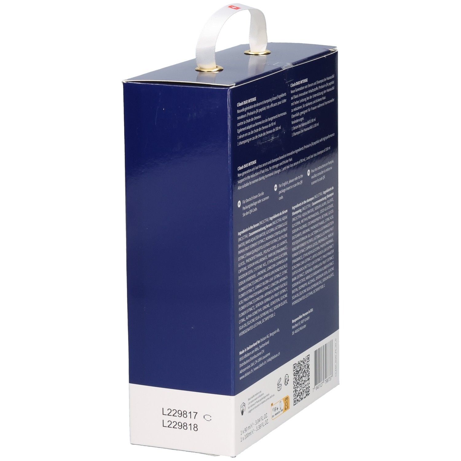 Seitenansicht der Cilash Duo Intense Geschenkbox, dunkelblau, mit Henkel und Sichtfenster.