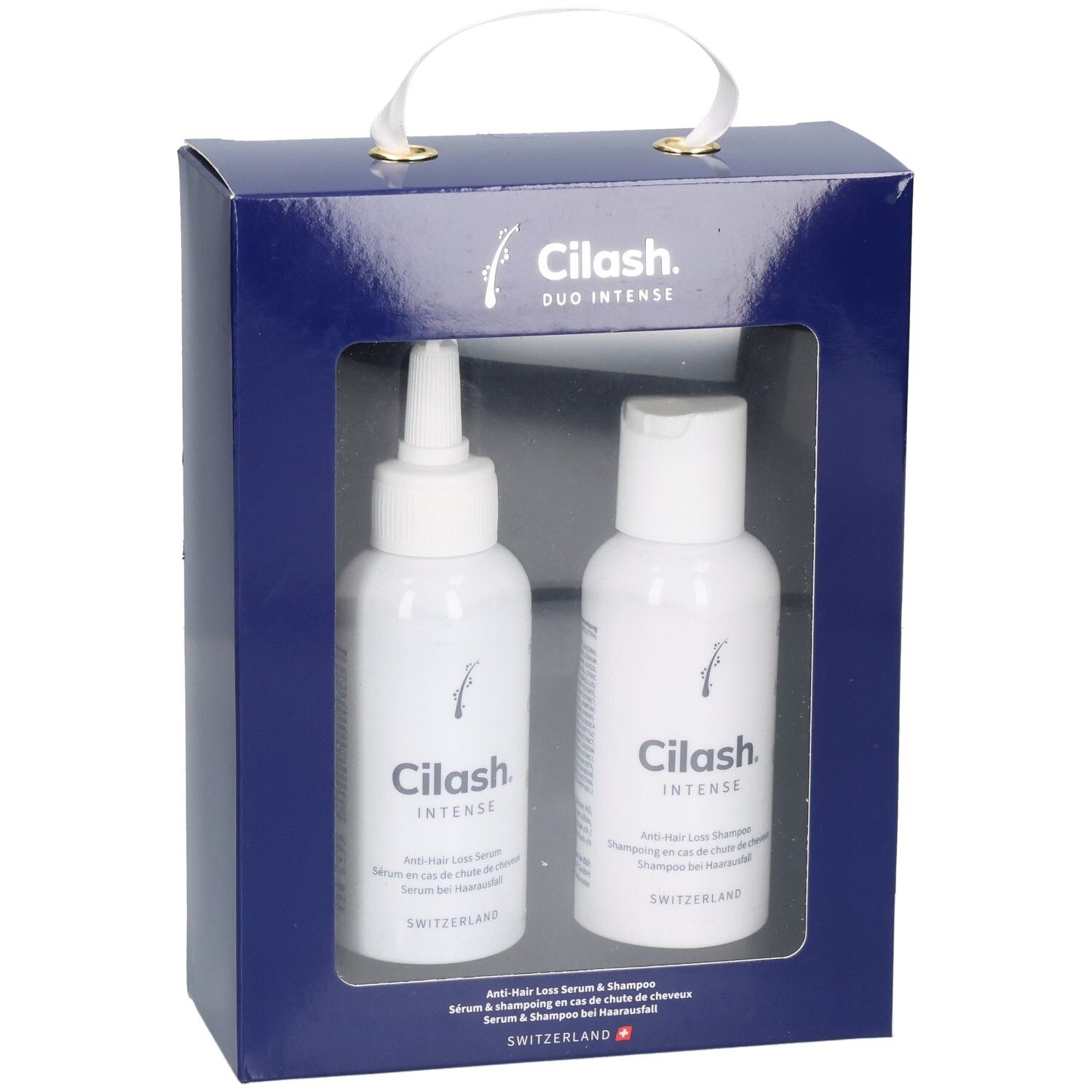 Cilash Duo Intense Set: Anti-Haarausfall Serum und Shampoo in dunkelblauer Geschenkbox mit Sichtfenster.