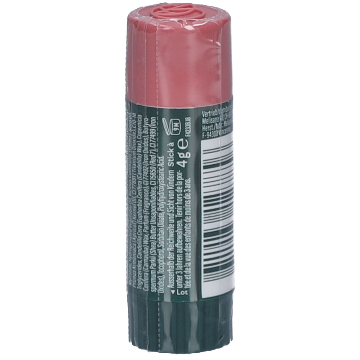 Lippenpflegestift mit rosafarbenem Deckel und grünem Etikett. Rückseite mit Text, Inhaltsstoffen und Warnhinweis.