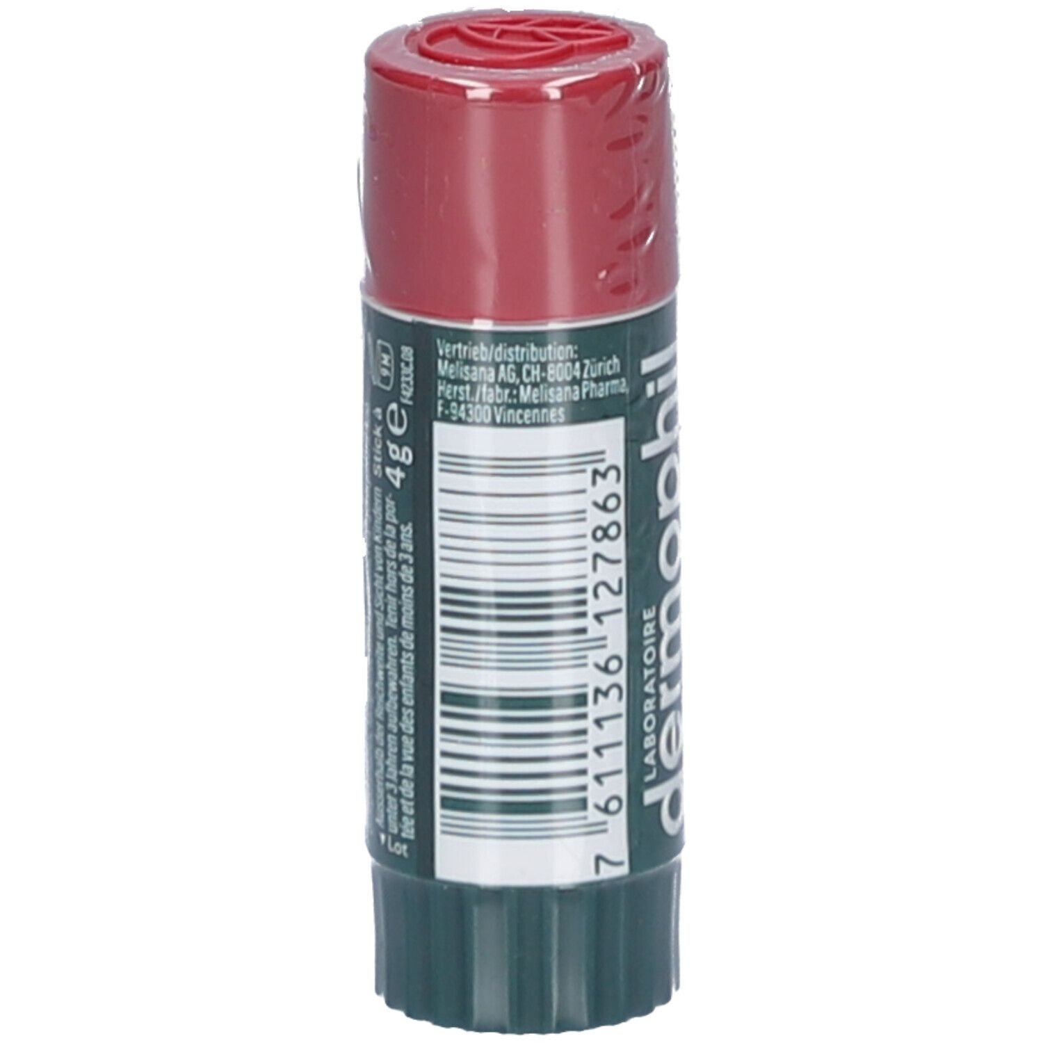 Stick lèvres Dermophil, rouge et vert. Dos avec texte et code-barres. Emballé dans du film. Taille : 4g.