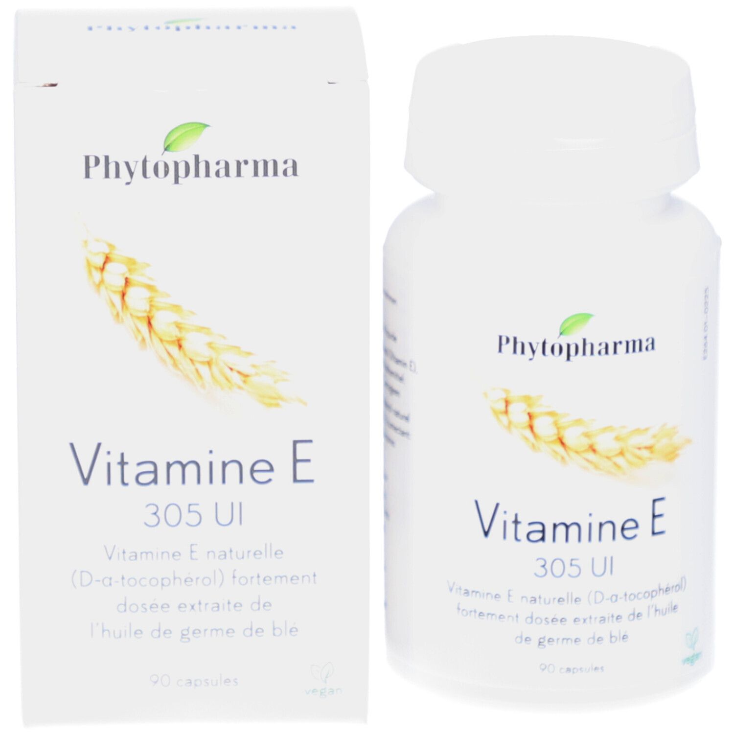 Weiße Flasche und Schachtel. Aufschrift: Phytopharma, Vitamin E 305 UI. 90 Kapseln. Abbildung von Weizenähren.