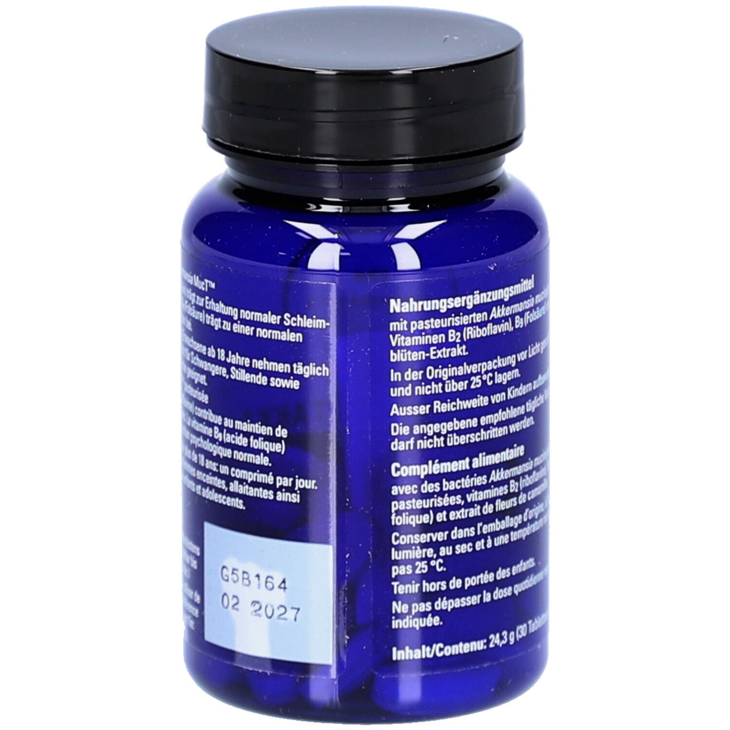 Rückseite der blauen Flasche. Text in Deutsch und Französisch. Mindesthaltbarkeitsdatum 02 2027.