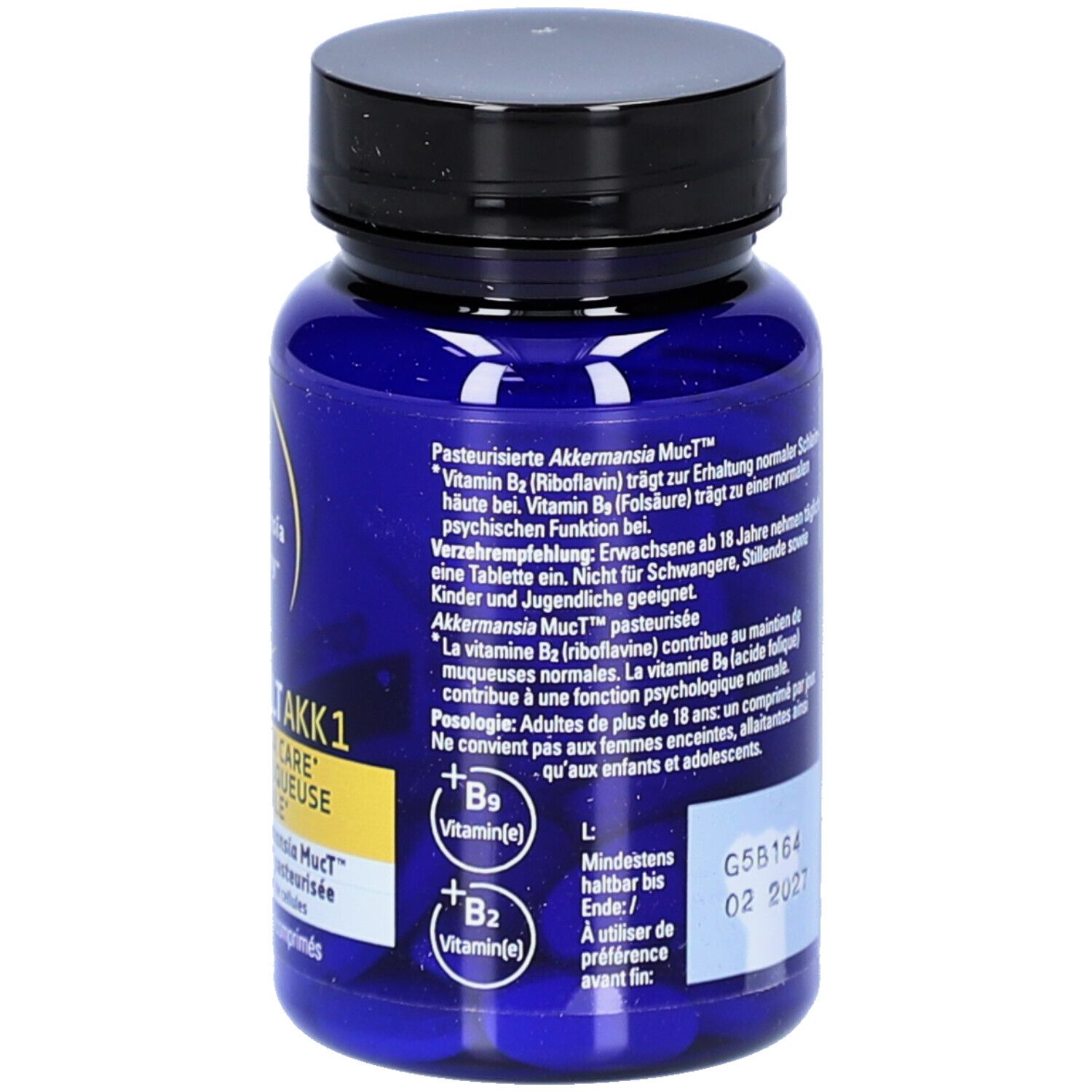 Rückseite der blauen Flasche. Text in Deutsch und Französisch. Mindesthaltbarkeitsdatum 02 2027.