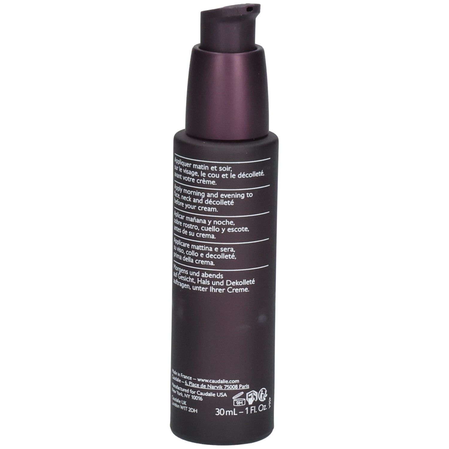 Rückseite der dunkelvioletten Flasche. Text in mehreren Sprachen, darunter Deutsch und Französisch.