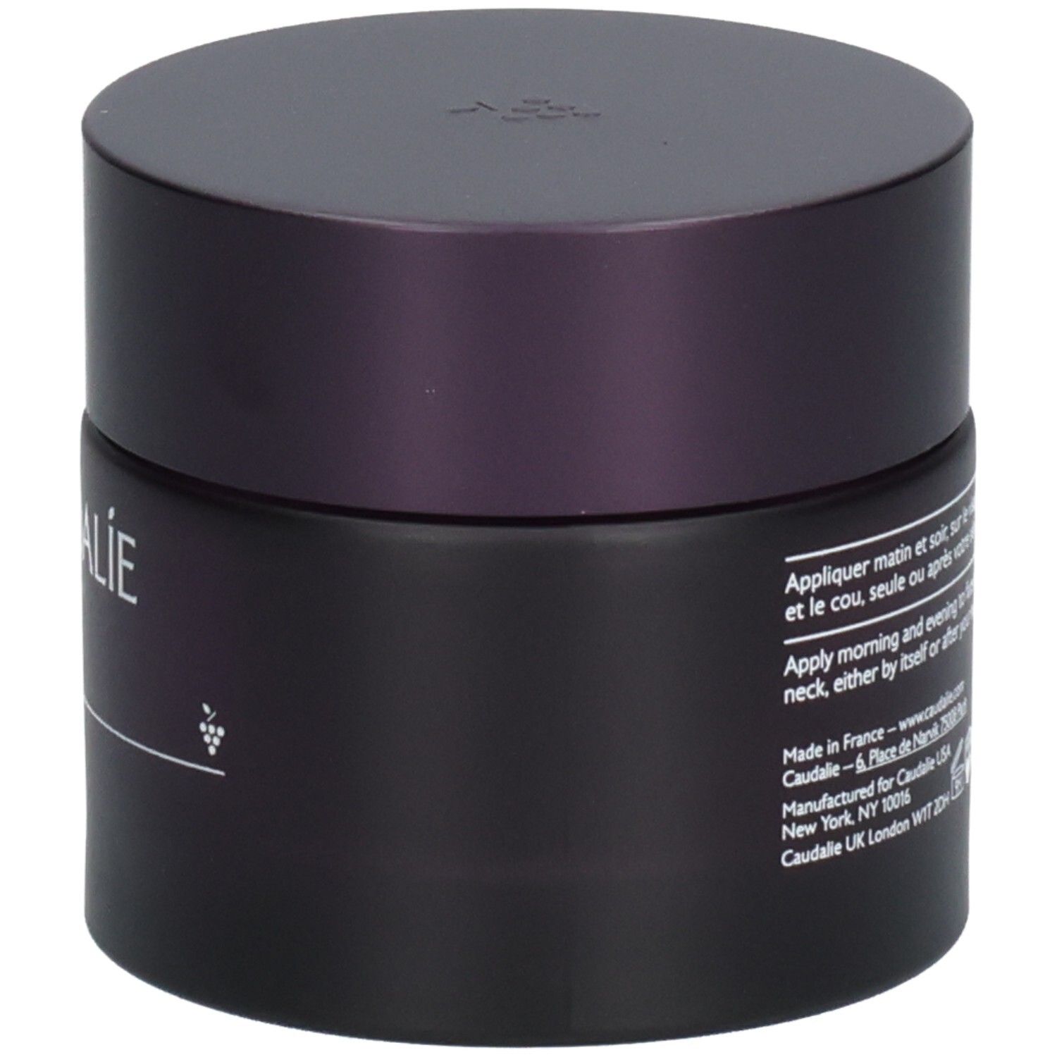 Dunkelviolettes Tiegel mit Deckel. Aufschrift: Caudalie Paris, Premier Cru La Crème The Cream. Trauben-Symbol.
