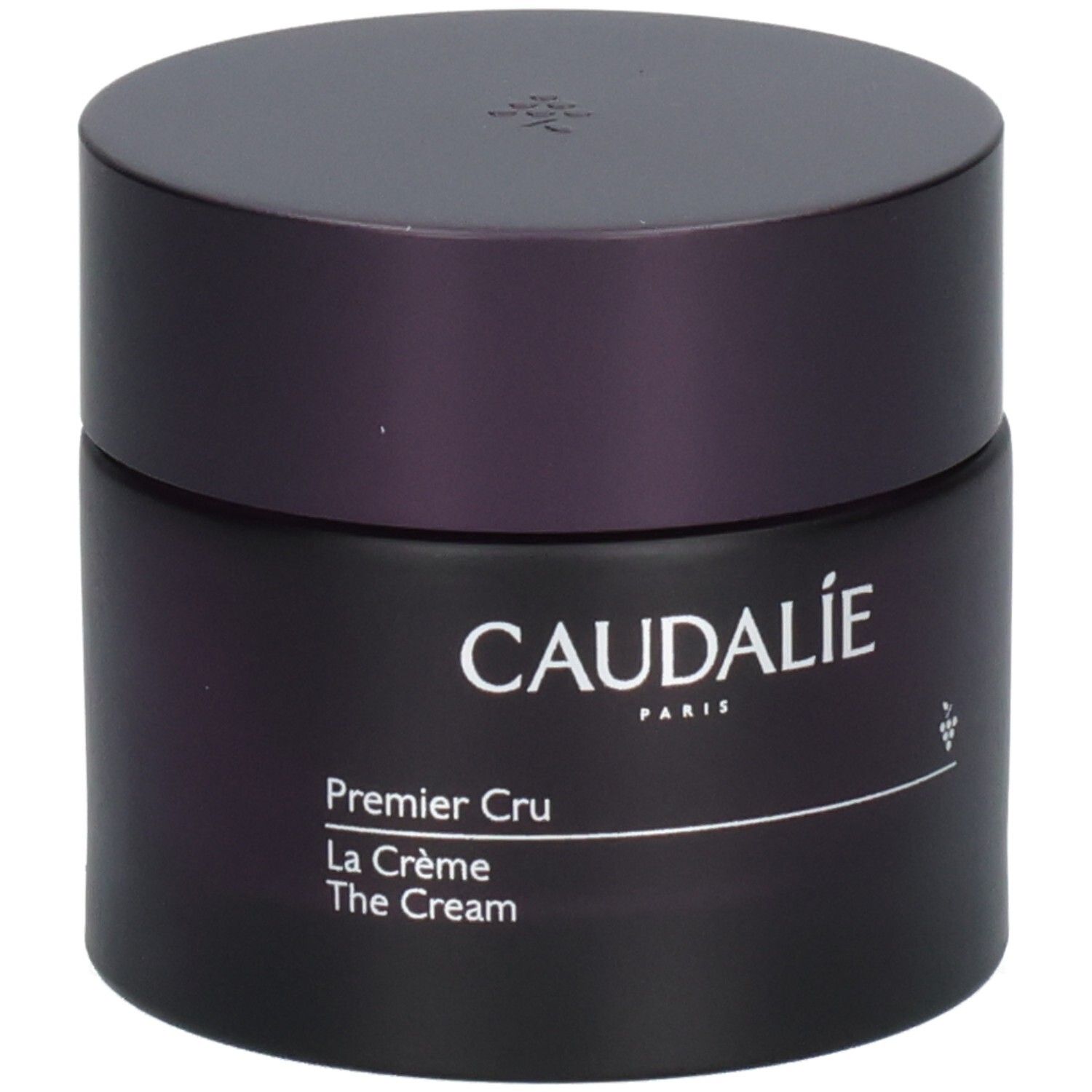 Dunkelviolettes Tiegel mit Deckel. Aufschrift: Caudalie Paris, Premier Cru La Crème The Cream. Trauben-Symbol.