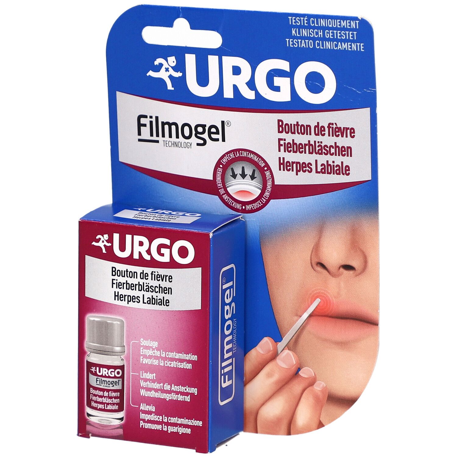 Verpackung mit Produkt und Fläschchen. Aufschrift URGO Filmogel. Person mit Lippen. Applikator wird verwendet.