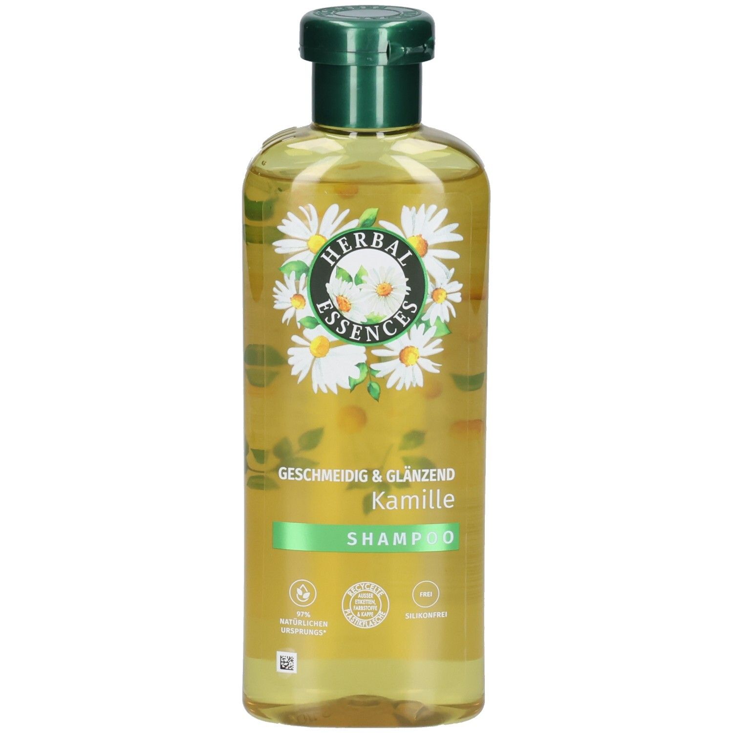 Flacon de shampooing avec étiquette à la camomille. Bouchon vert, liquide transparent. Inscription: HERBAL ESSENCES, Kamille, Shampooing.