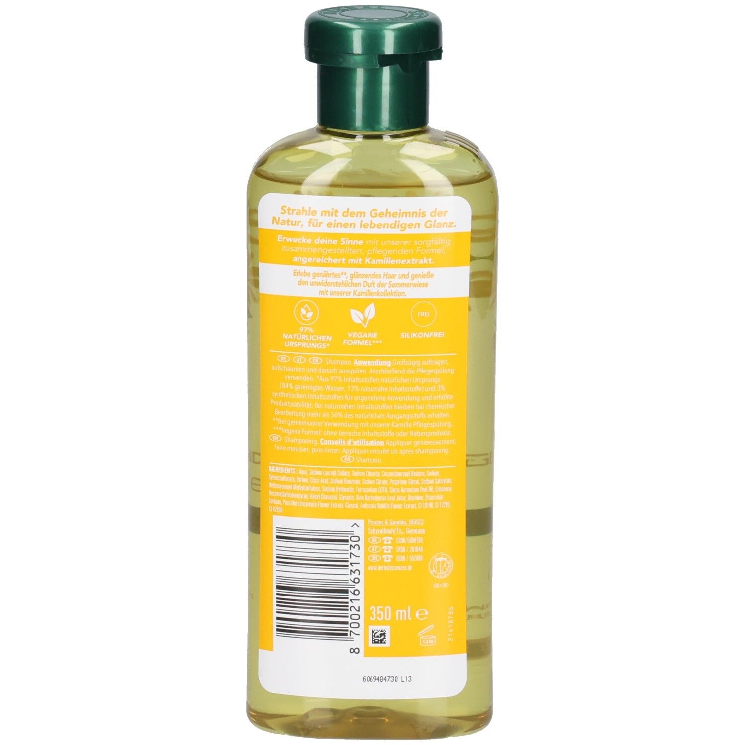 Dos du flacon de shampooing. Étiquette jaune avec texte et logos. Bouchon vert. Inscription: 350 ml.