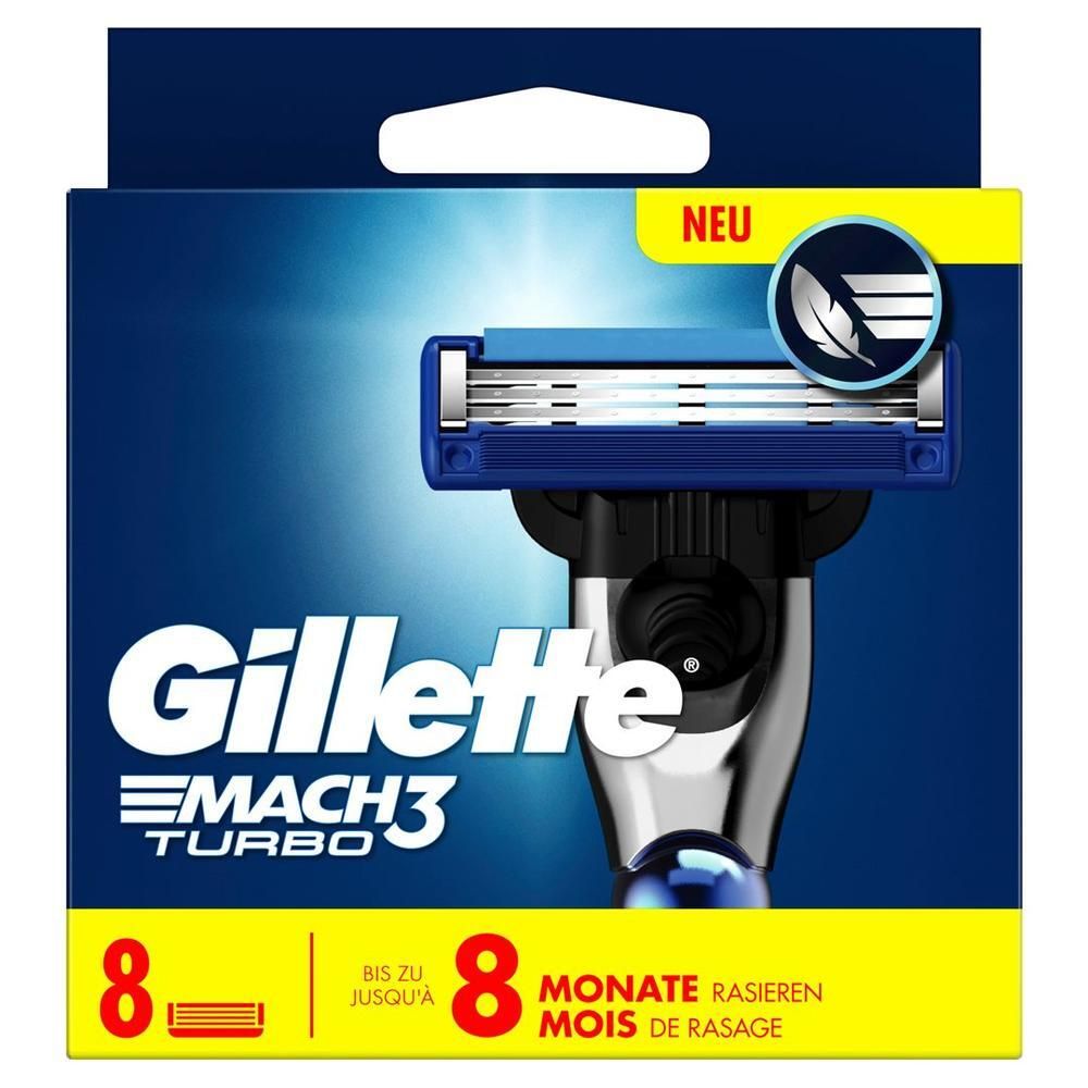 Verpackung mit Rasierklingen. Enthält 8 Klingen. Marke: Gillette Mach3 Turbo. Blaue und gelbe Verpackung mit Rasierer-Abbildung.