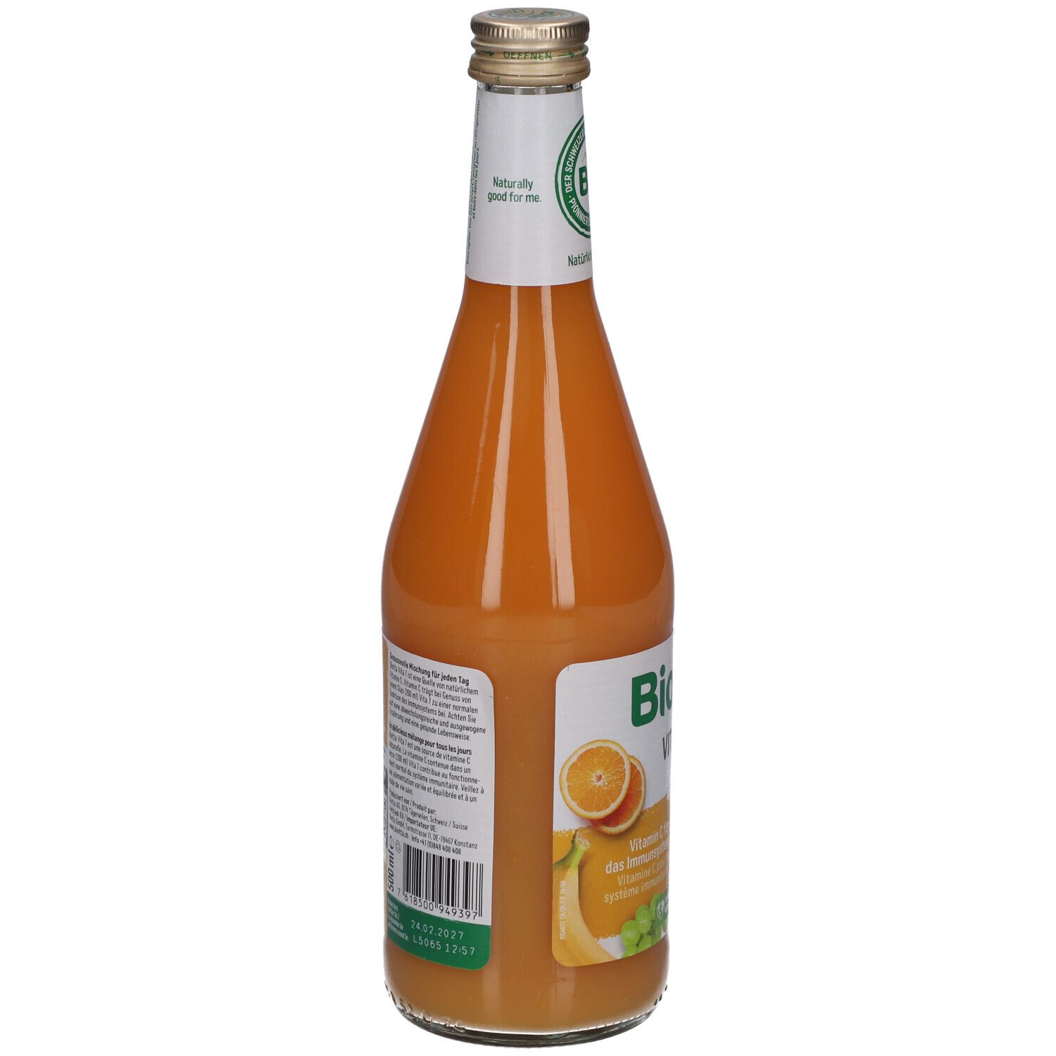 Rückseite der Glasflasche BIOTTA Vita 7. Etikett mit Text und Barcode. BIO-Siegel. Orangefarbener Saft sichtbar.