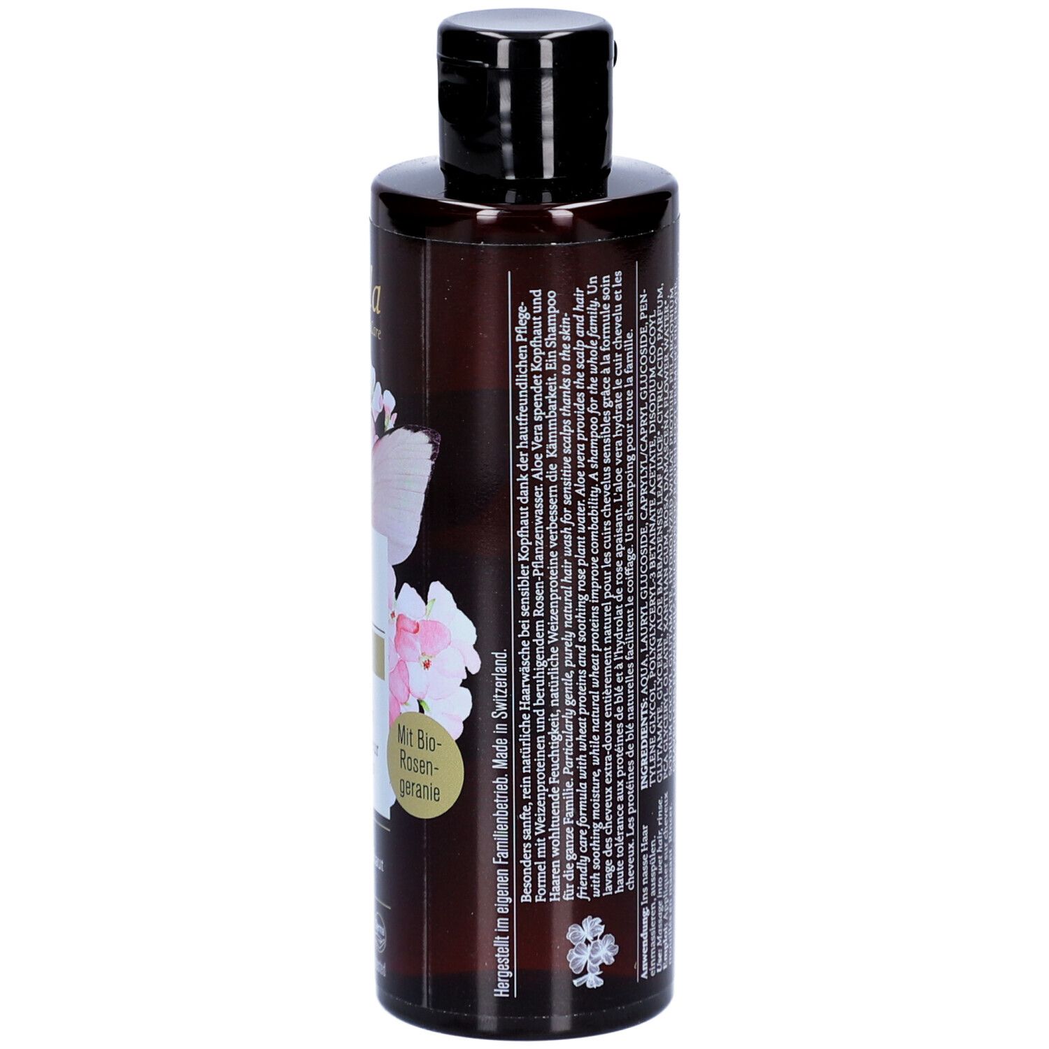 Dos du flacon de shampooing Farfalla brun. Texte: ingrédients, informations fabricant, 200ml. Logos: Vegan, Swiss, Natural, testé.