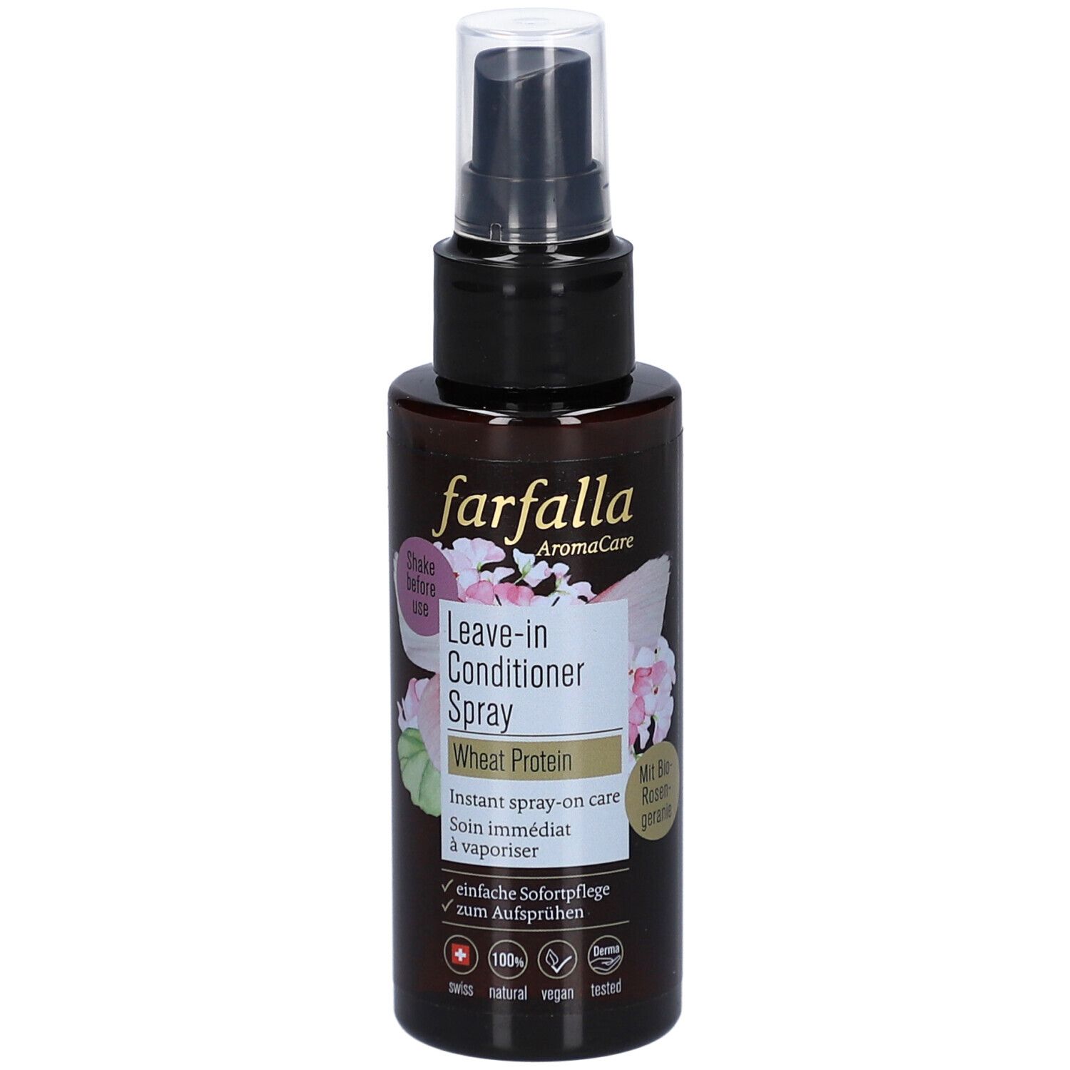 Flacon spray brun avec tête noire. Inscription: farfalla, Leave-in Conditioner Spray, Wheat Protein. Décor floral.