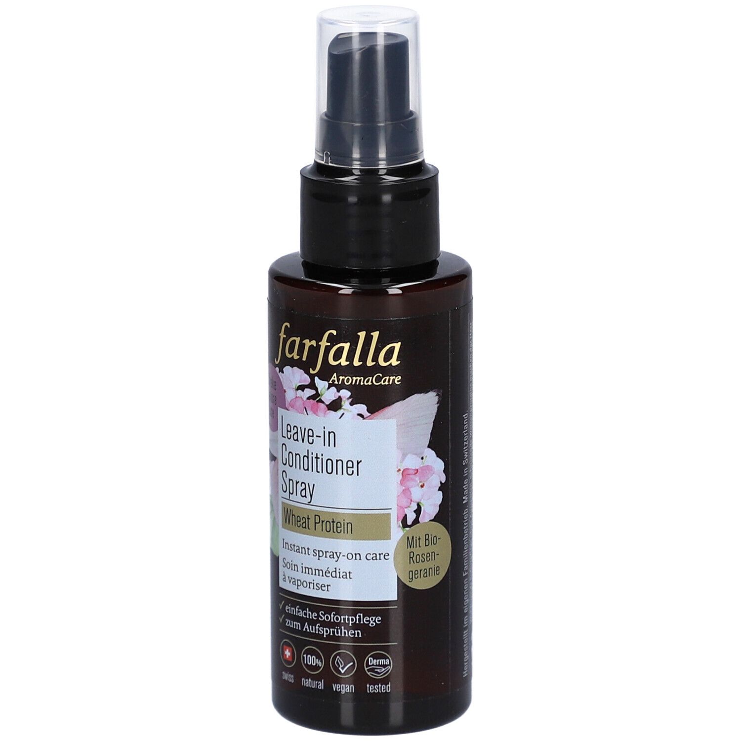 Flacon spray brun avec tête noire. Inscription: farfalla, Leave-in Conditioner Spray, Wheat Protein. Décor floral.