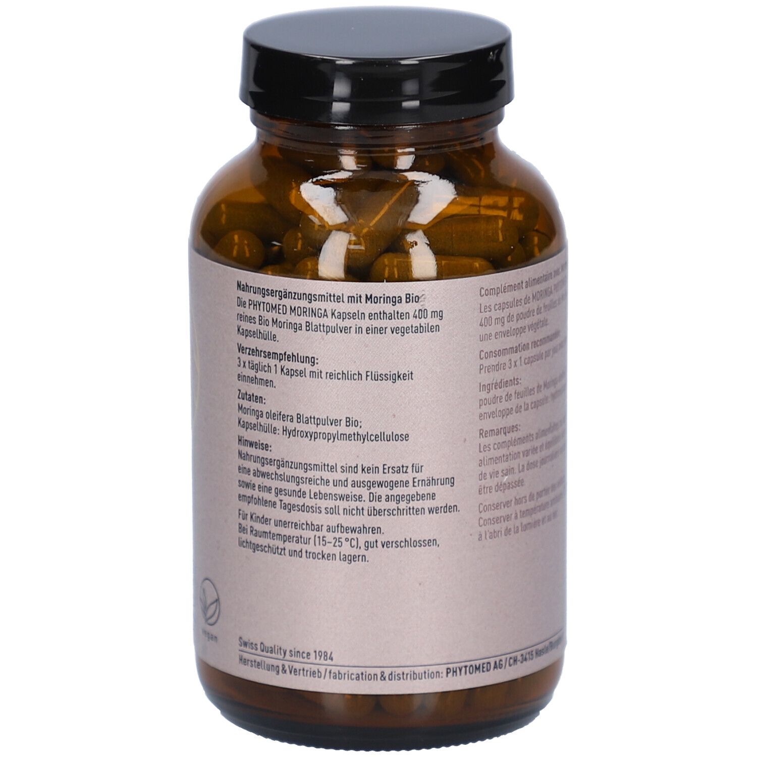 Dos du flacon avec texte. Moringa Bio Kapseln. Ingrédients. Recommandations. Label Swiss Quality.