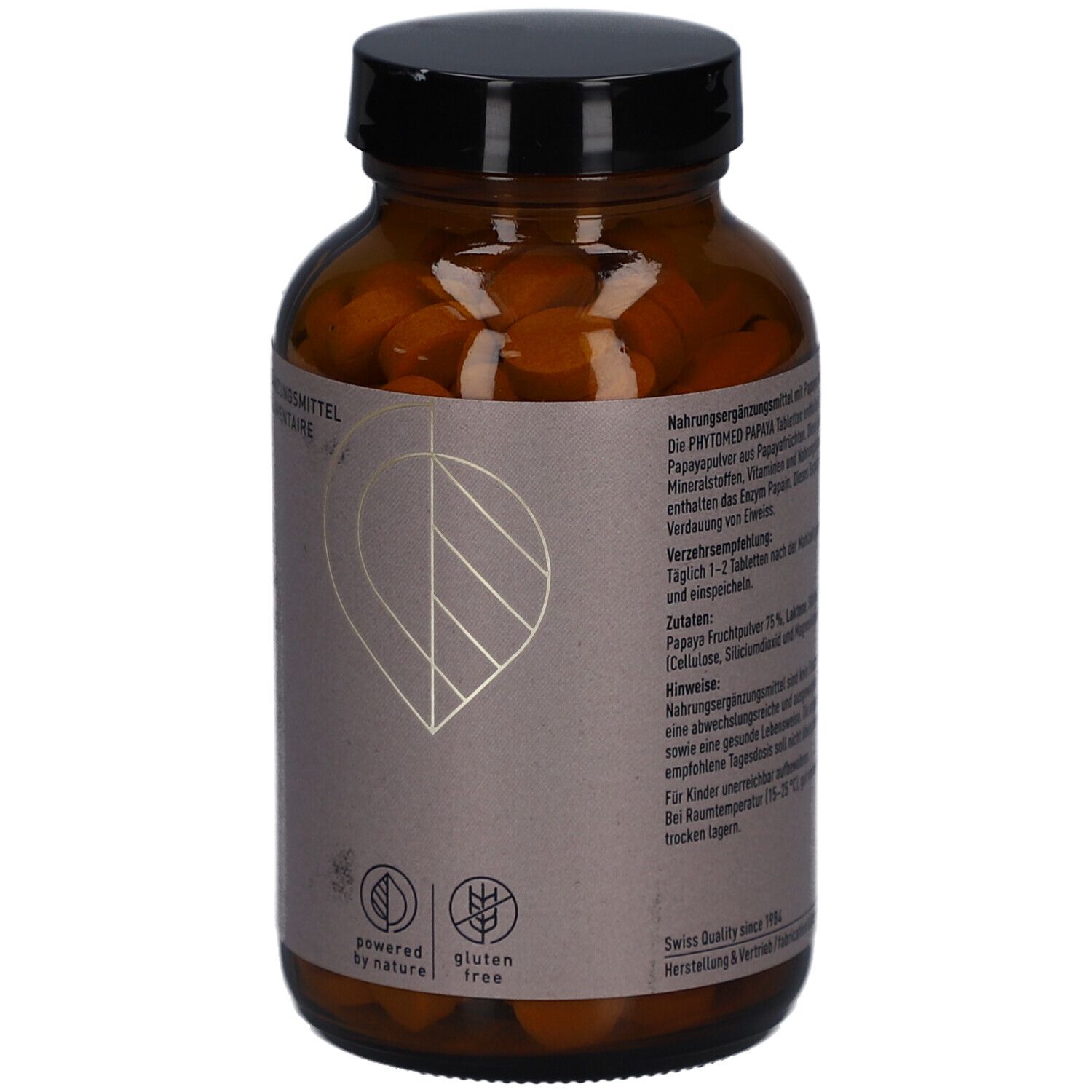 Rückseite der braunen Glasflasche mit Papaya Tabletten. Text in Deutsch und Französisch. Logo: glutenfrei und powered by nature.