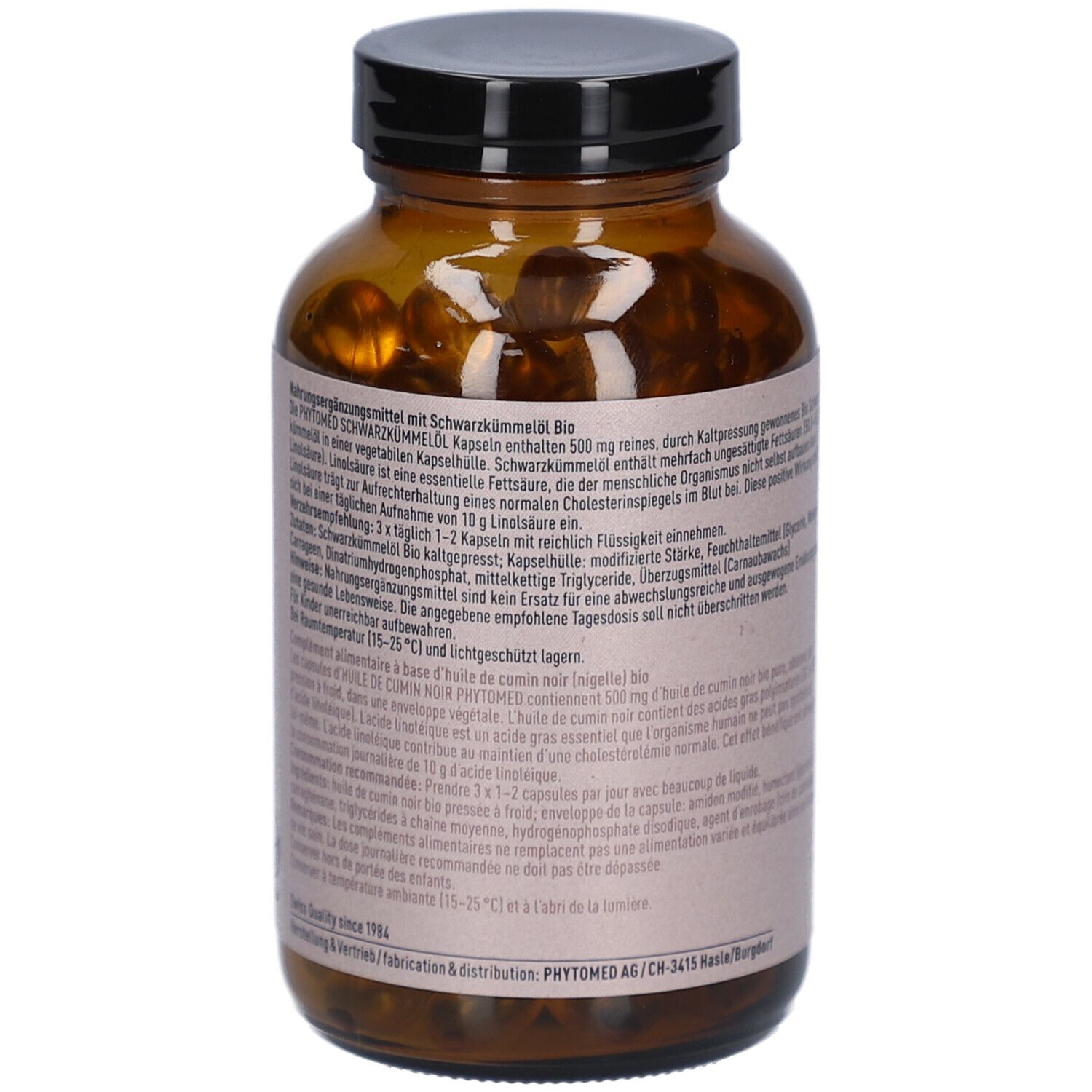 Braune Glasflasche mit Text. Enthält Informationen über Inhaltsstoffe und Anwendung. Mit Text in Deutsch und Französisch.