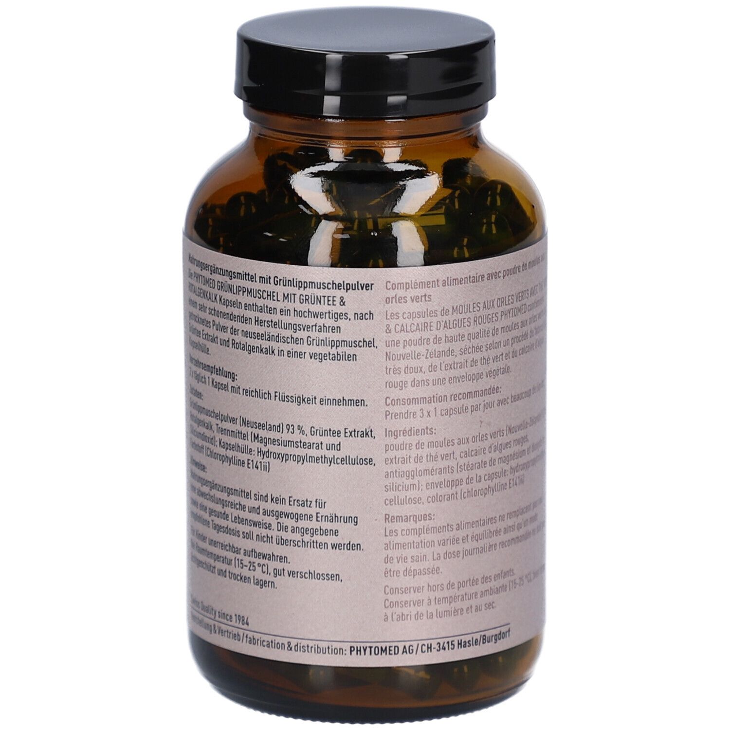 Braune Glasflasche mit schwarzen Deckel. Etikett mit Produktinformationen, Inhaltsstoffen und Dosierung. Logo: Phytomed.