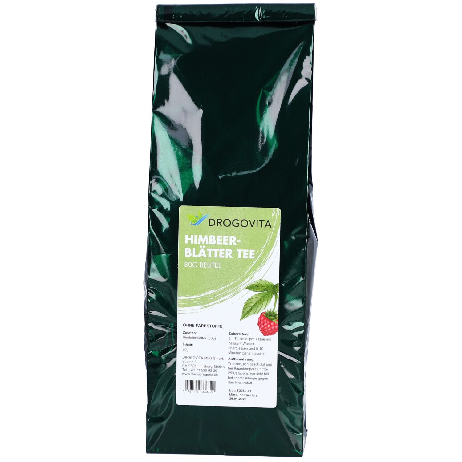 Emballage vert foncé avec étiquette. DROGOVITA Tisane de feuilles de framboisier. Image d'une framboise et de feuilles.