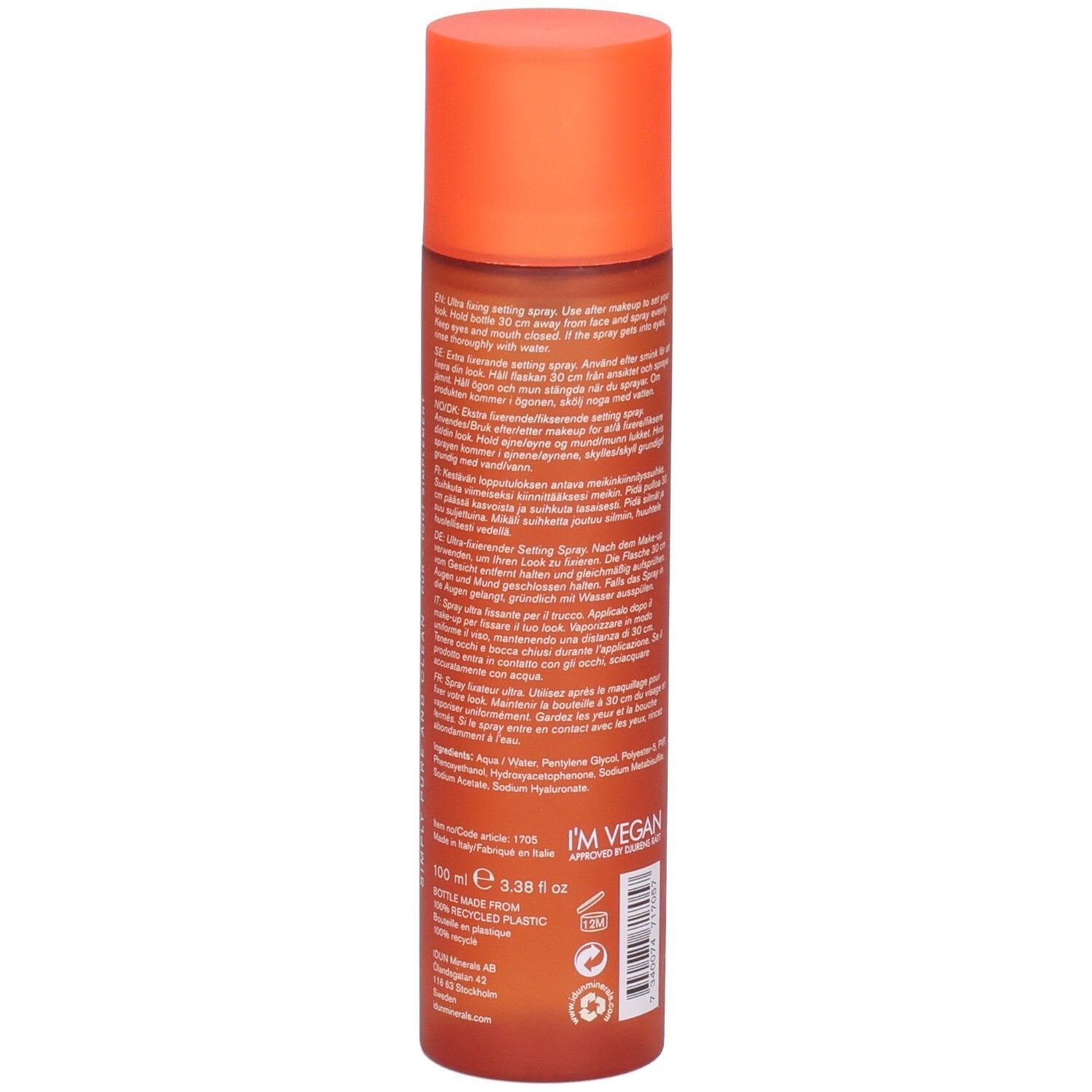 Rückseite der orangefarbenen Sprühflasche. Text in mehreren Sprachen. Vegan-Logo. 100 ml. Recycling-Logo.