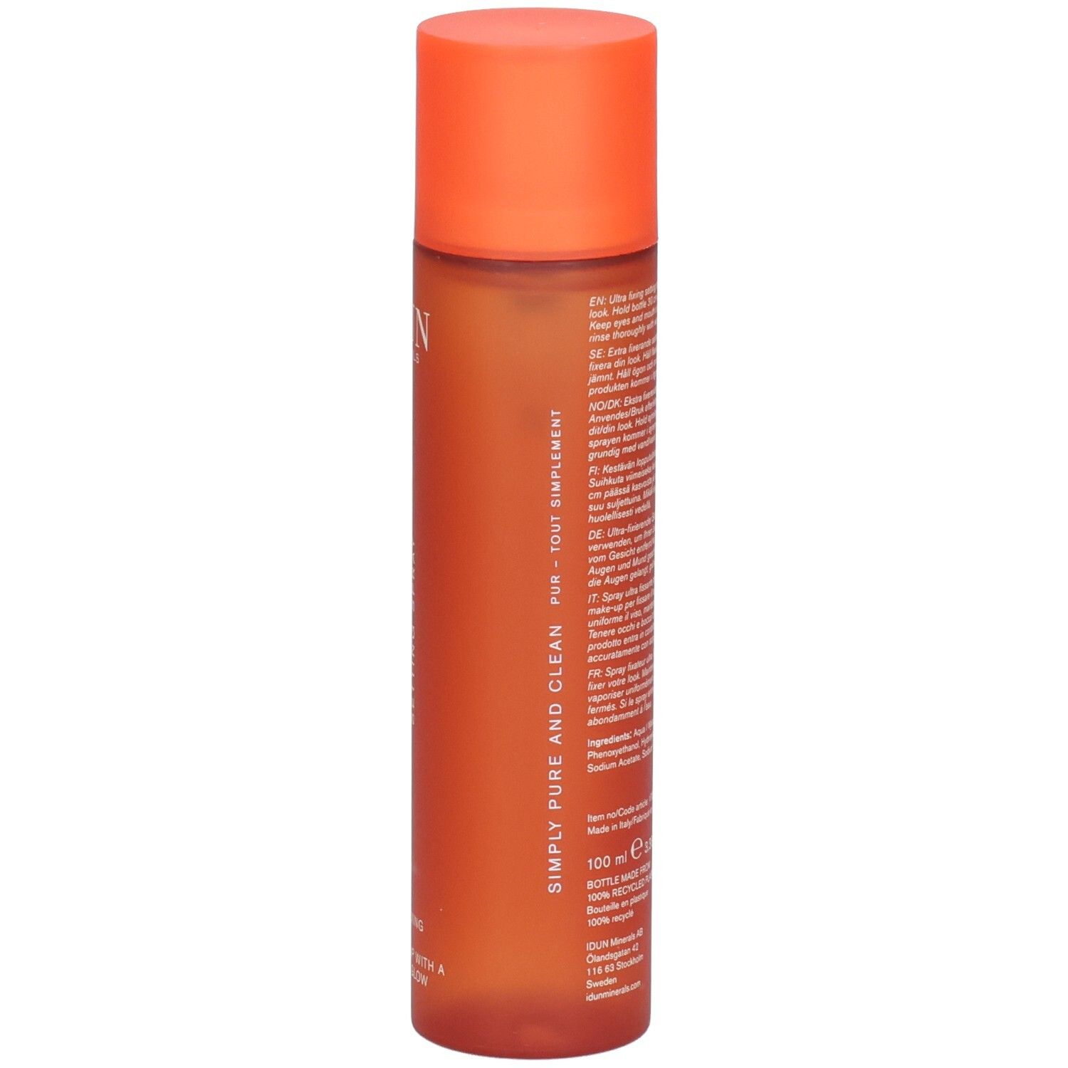 Rückseite der orangefarbenen Sprühflasche. Text in mehreren Sprachen. 100 ml. Recycling-Logo. Vegan-Logo.