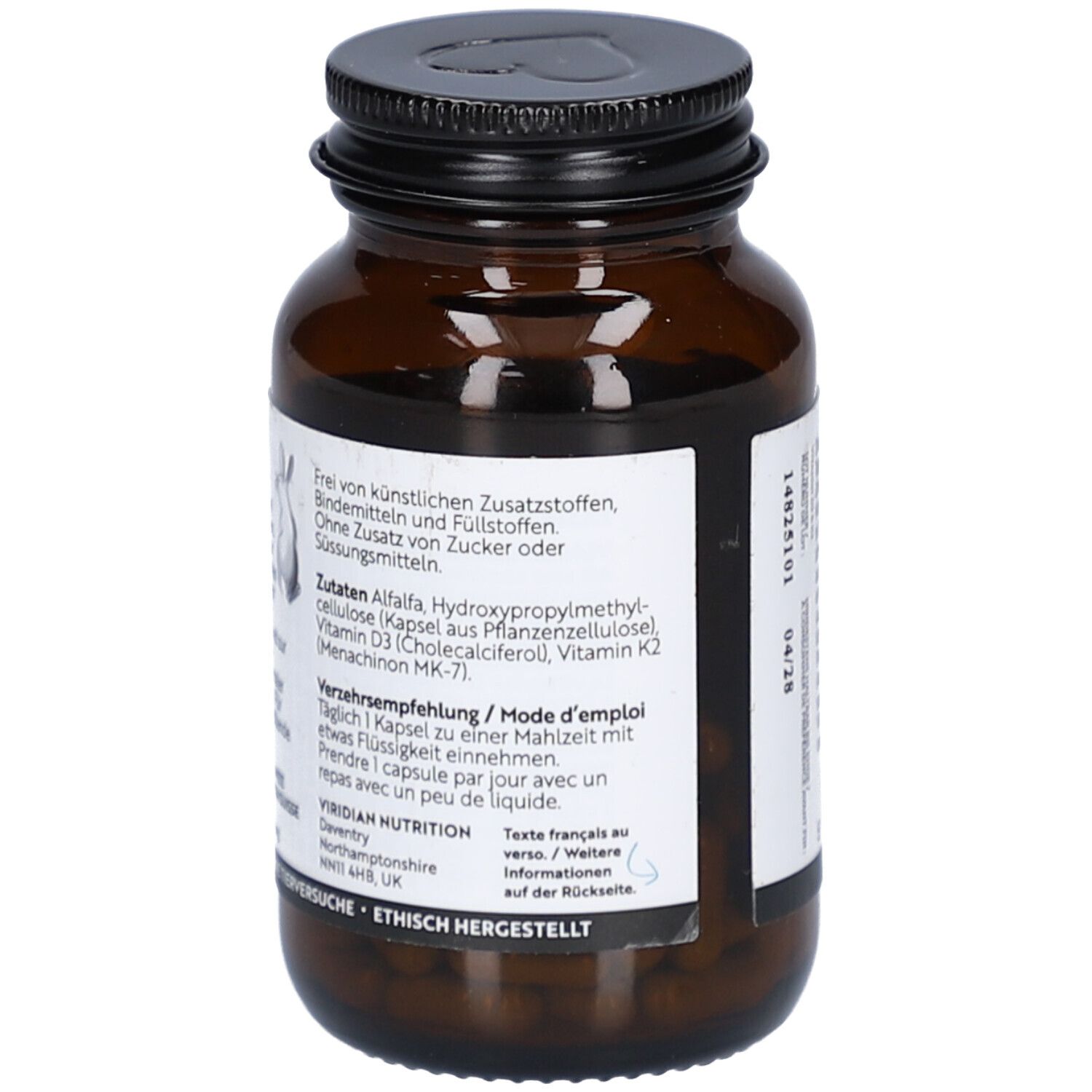 Dos du flacon en verre brun. Étiquette avec ingrédients et recommandation d'utilisation. Vegan.