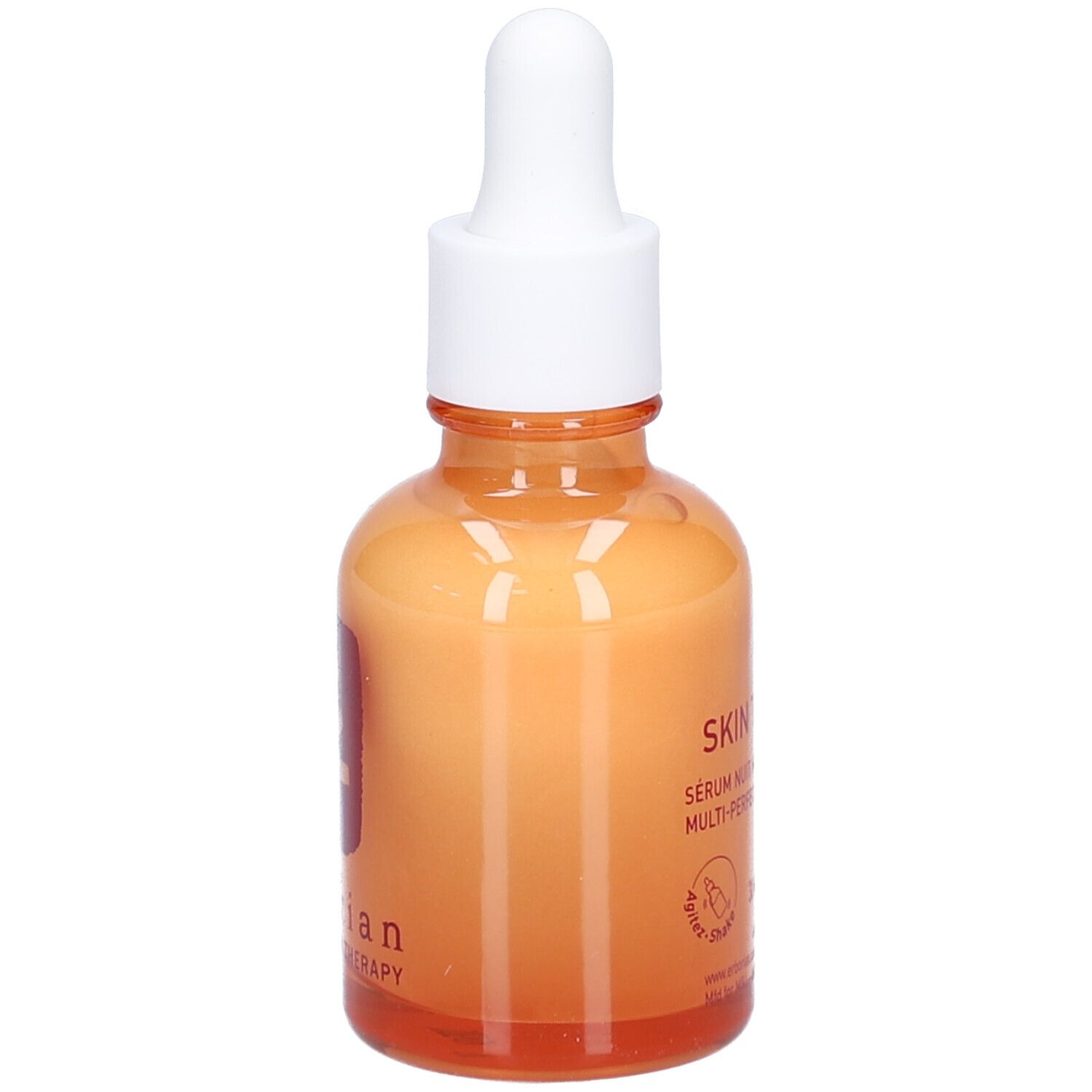 Flacon en verre orange avec bouchon blanc et pipette. Inscription Skin Therapy. Soin de nuit.