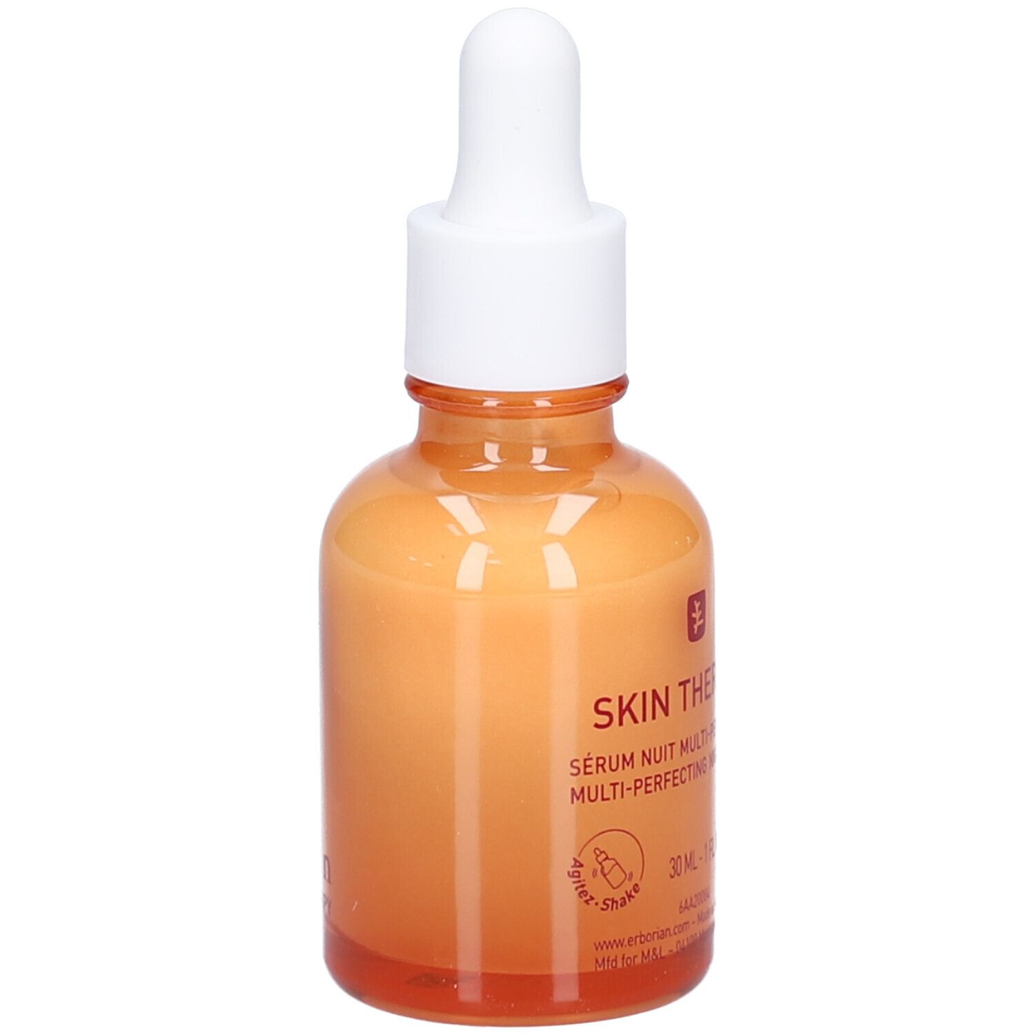 Flacon en verre orange avec bouchon blanc et pipette. Inscription Skin Therapy. Soin de nuit.