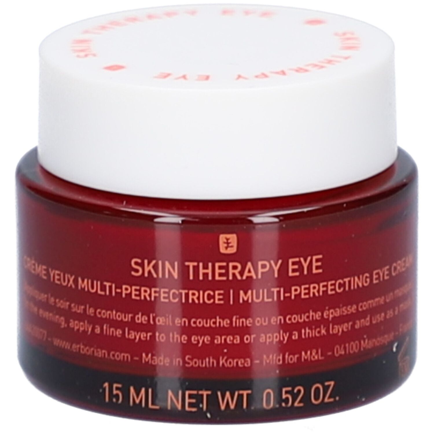 Pot rouge avec couvercle blanc. Texte: "SKIN THERAPY EYE". Inscription: 15 ml NET WT. 0.52 OZ. Texte: Made in South Korea.