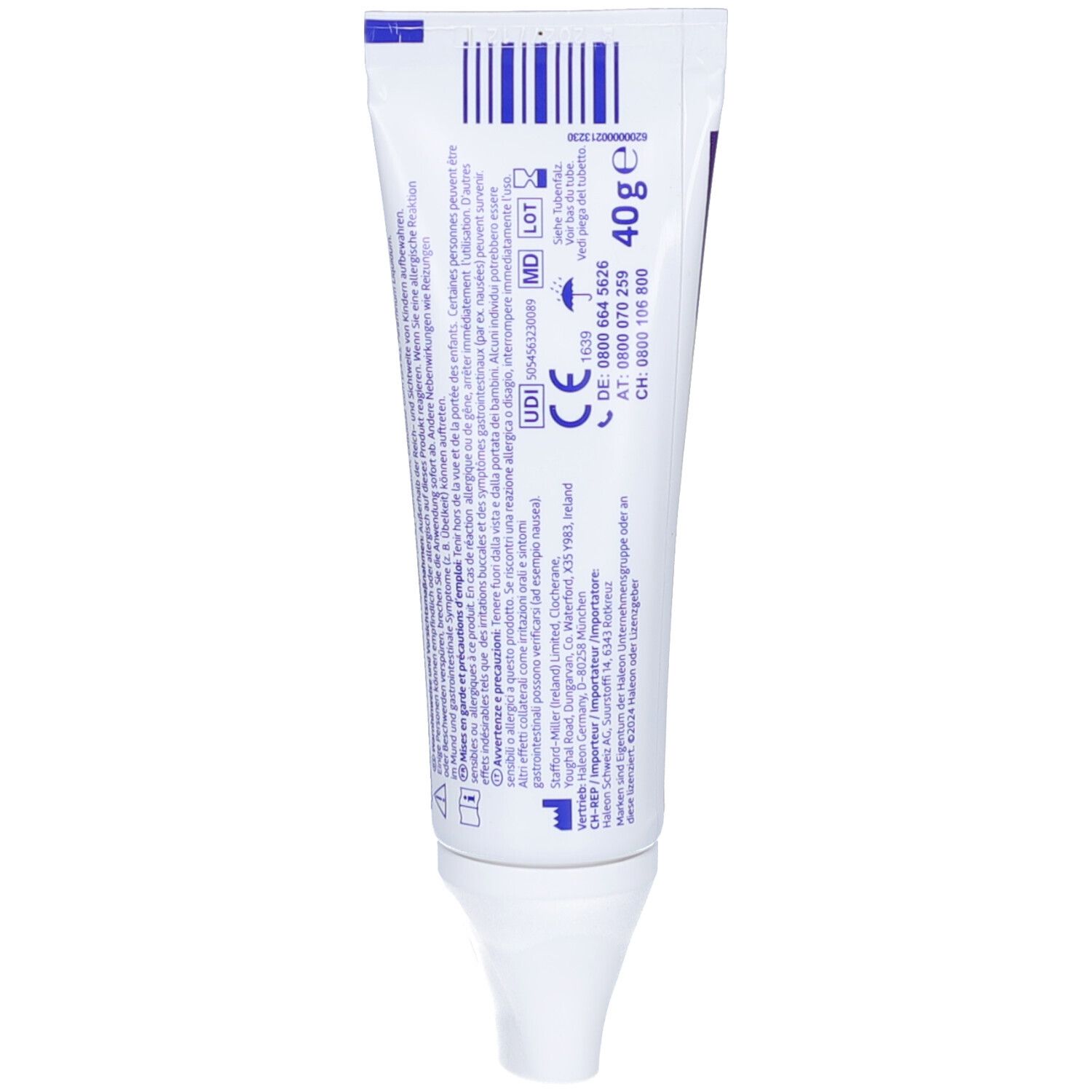 Dos du tube de crème adhésive COREGA ULTRA. Blanc avec texte et code-barres. Informations sur les ingrédients et le fabricant.