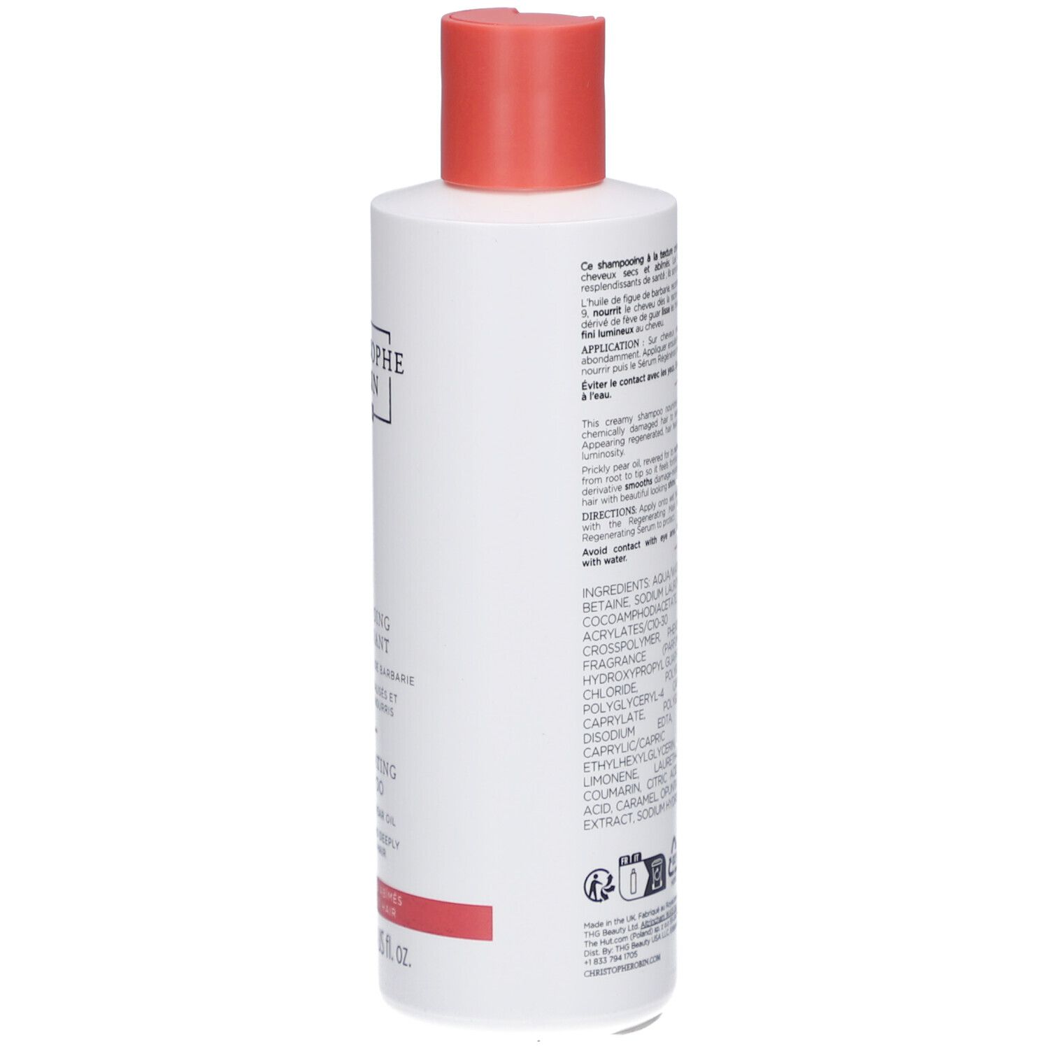 Rückseite der weißen Flasche. Text mit Inhaltsstoffen und Herstellerinformationen. Roter Streifen am unteren Rand. Schwarze Schrift.