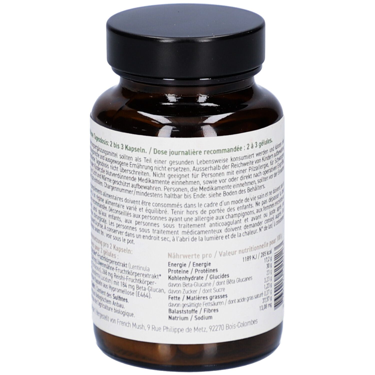 Dos du flacon en verre brun. Texte avec informations nutritionnelles. Inscription: French Mush, mélange d'extraits de champignons.