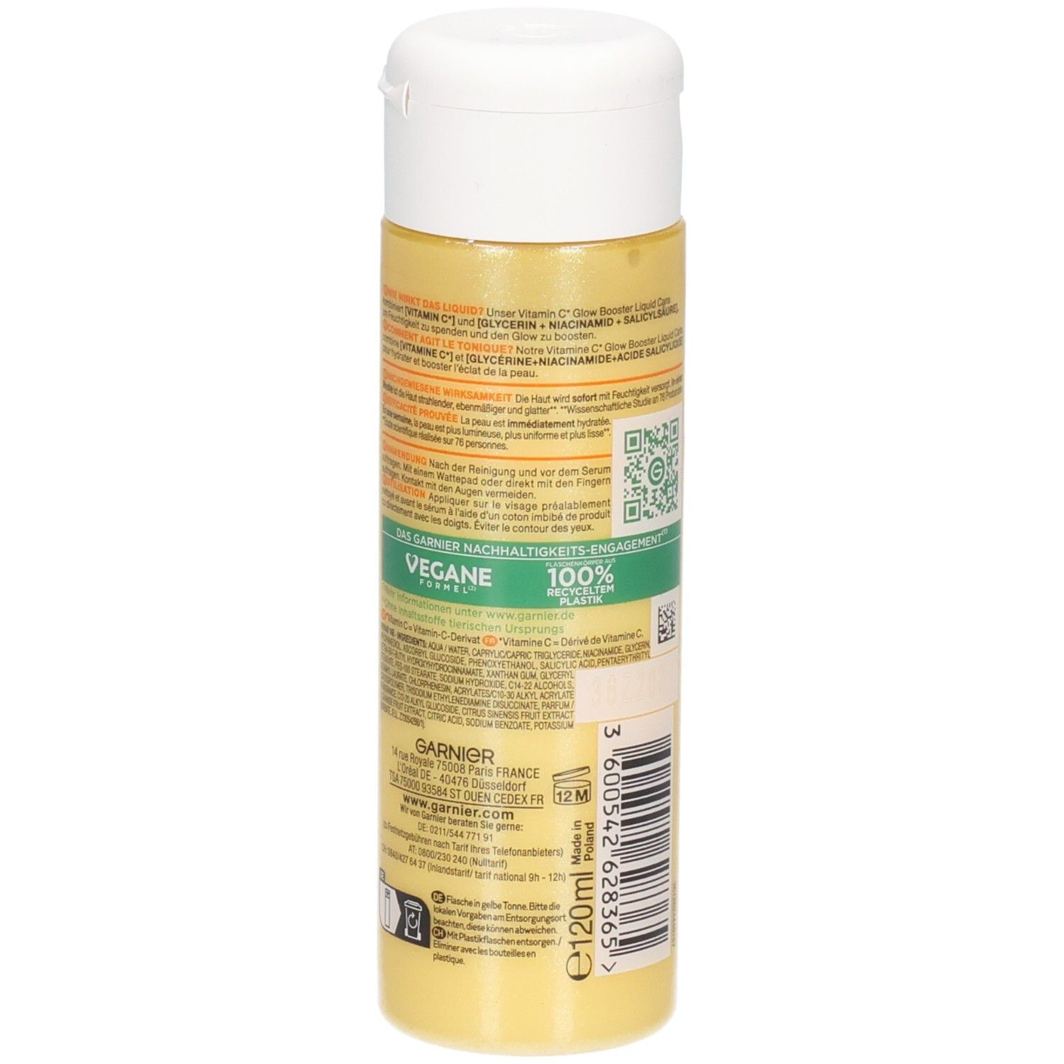 Vue latérale de la bouteille Garnier Vitamin C Glow Booster Liquid Care avec étiquette et sceau vegan.