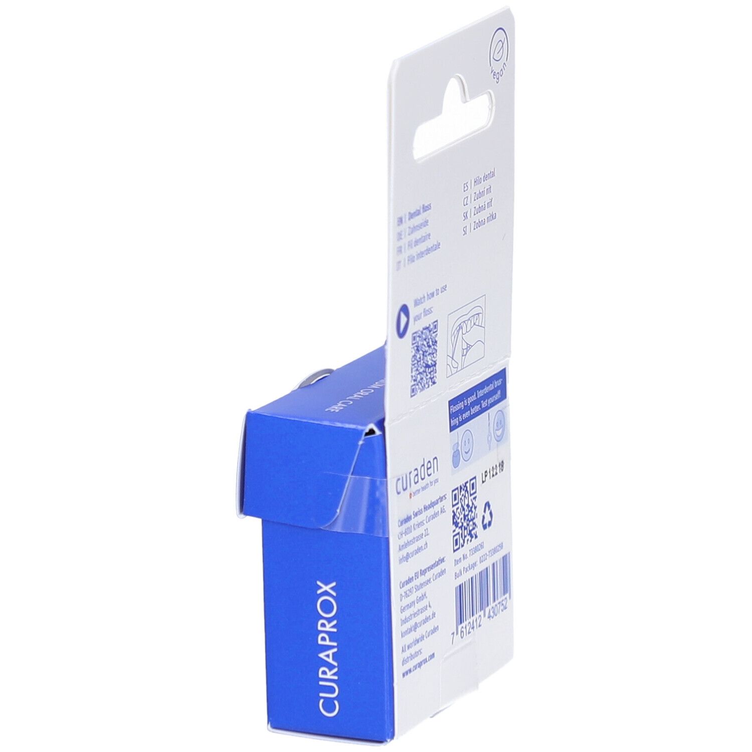Emballage bleu avec logo CURAPROX. Dos avec texte et code QR. Dispositif de suspension. Label vegan.