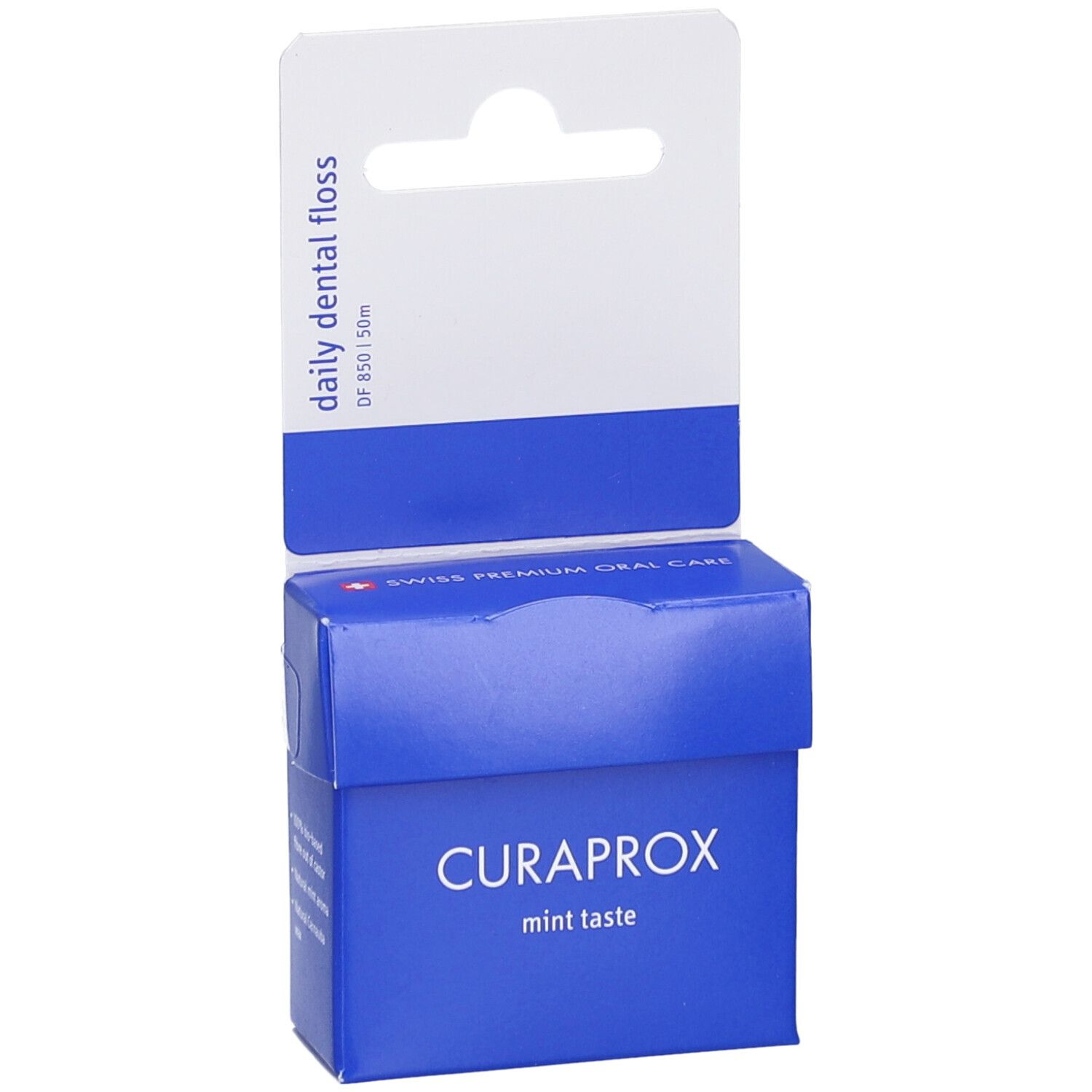 Emballage bleu avec suspension blanche. Logo CURAPROX et texte. Contient du fil dentaire. Inscription : mint taste.