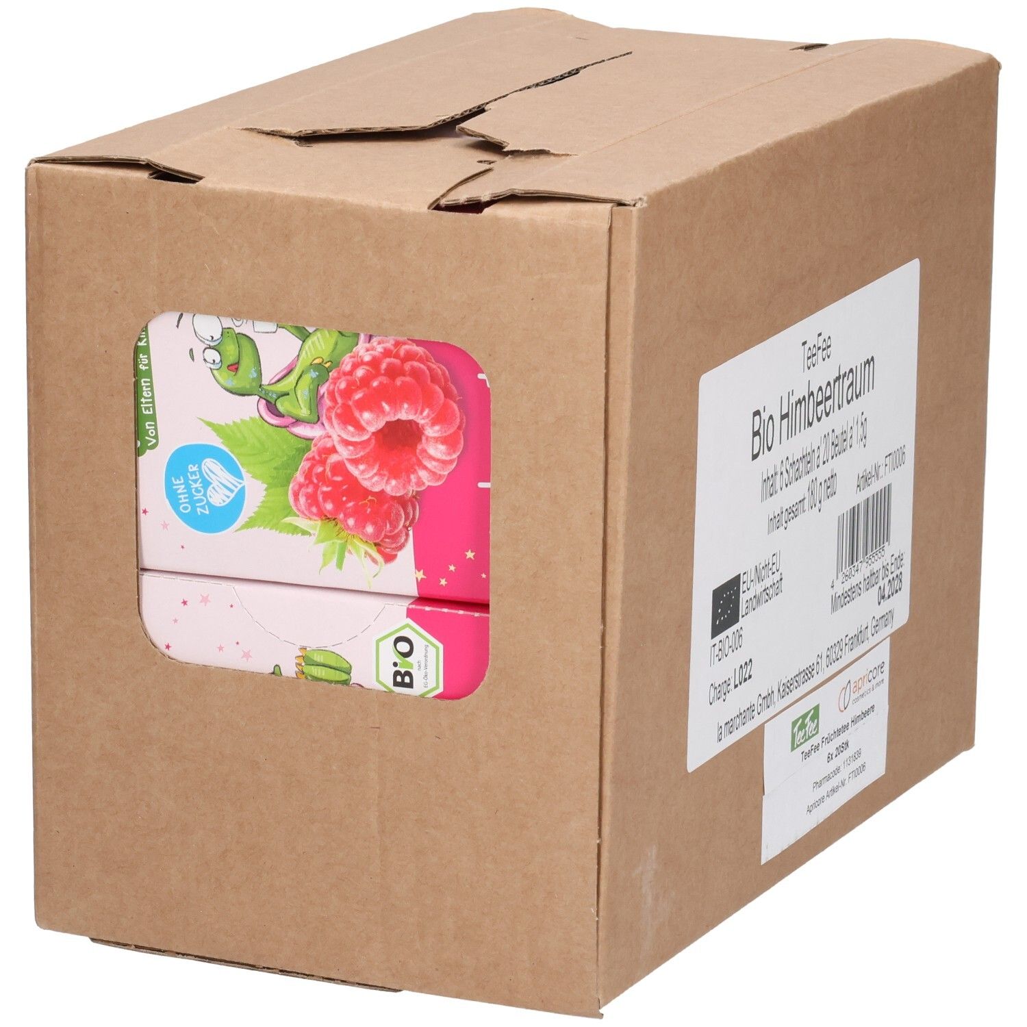 Karton mit Teebeuteln. Sichtfenster zeigt Teebeutel-Verpackung mit Himbeeren. Aufschrift: Bio Himbeertraum. EU-Bio-Siegel.