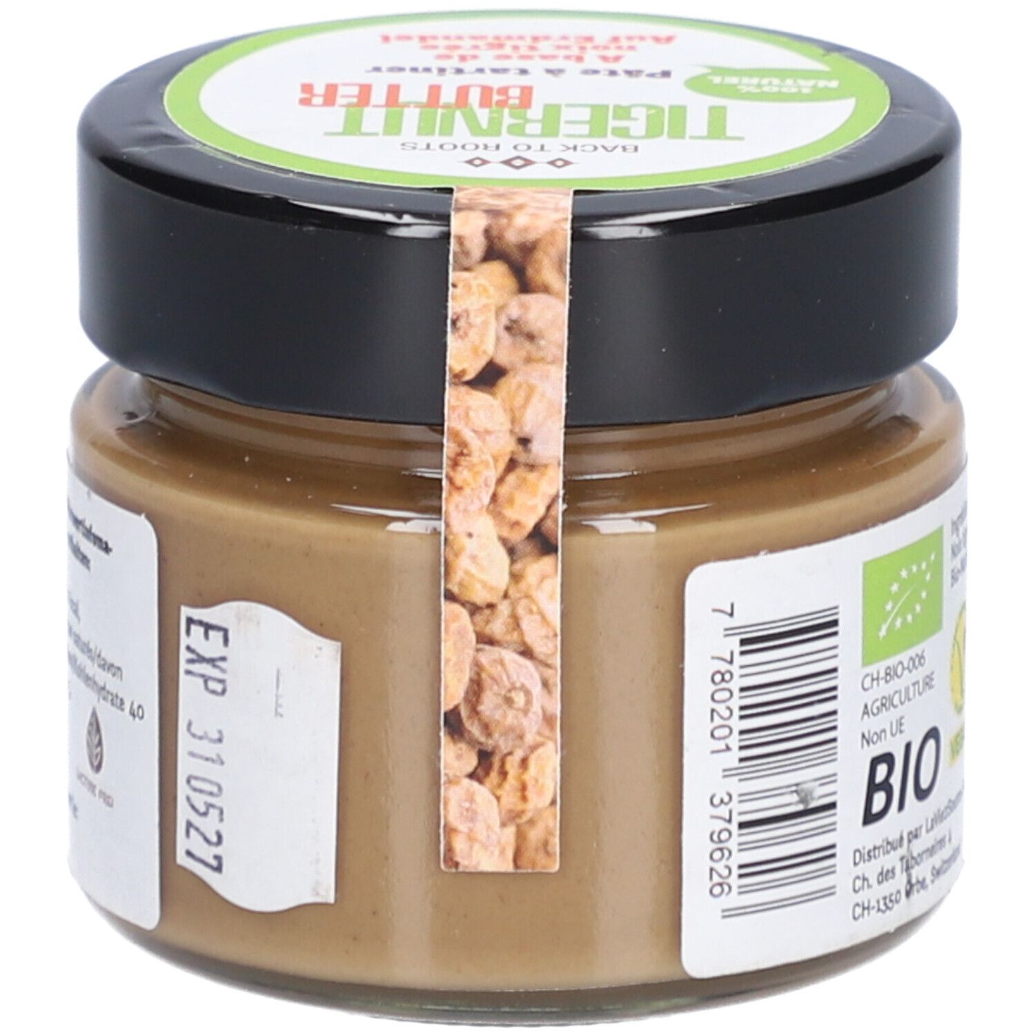 Glas mit Tigernussbutter. Etikett mit Chargennummer und Mindesthaltbarkeitsdatum. Rückseite mit Informationen.