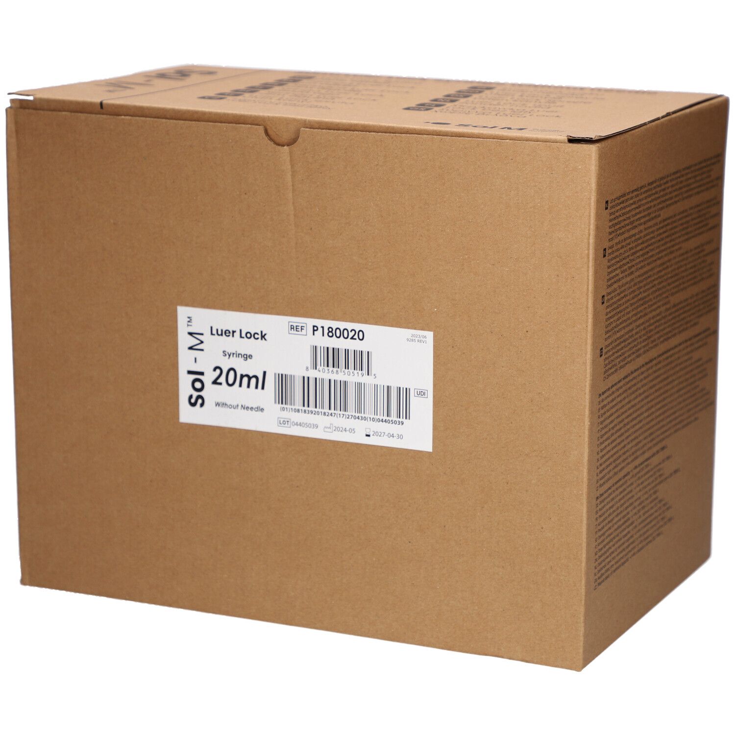 Karton mit Produktetikett. Beschriftung: Sol-M Luer Lock Spritze 20ml ohne Nadel. Barcode und Referenznummer.