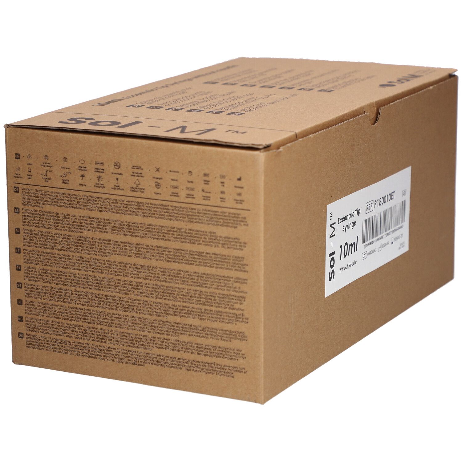 Emballage en carton avec texte et symboles. Sol-M est inscrit sur le carton. Étiquette avec informations sur le produit et code-barres.