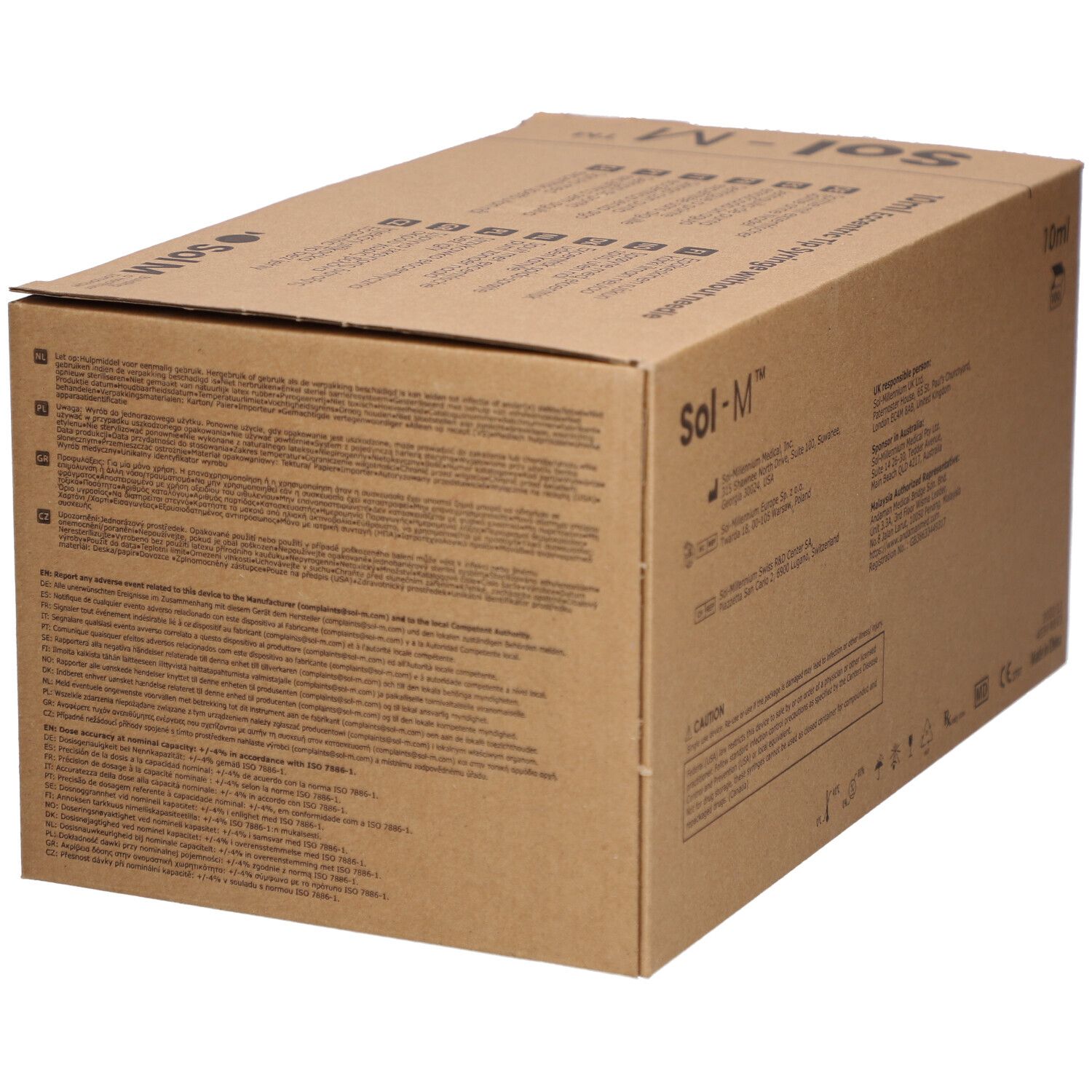 Emballage en carton avec texte et symboles. Sol-M est inscrit sur le carton. Avertissement et autres informations.