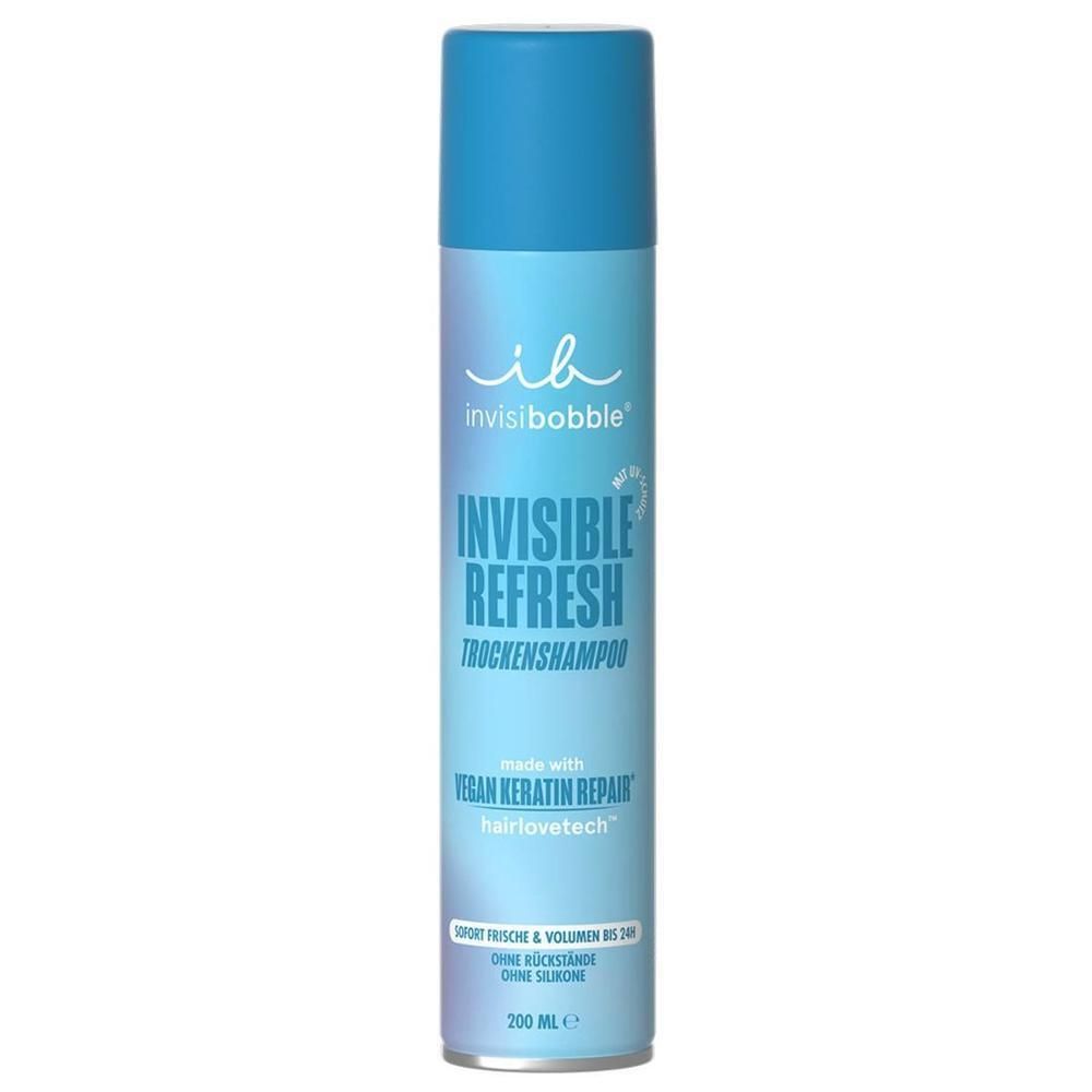 Zylindrische Flasche mit blauem Deckel. Aufschrift: INVISIBOBBLE, INVISIBLE REFRESH Trockenshampoo. Vegan Keratin Repair. 200 ml.