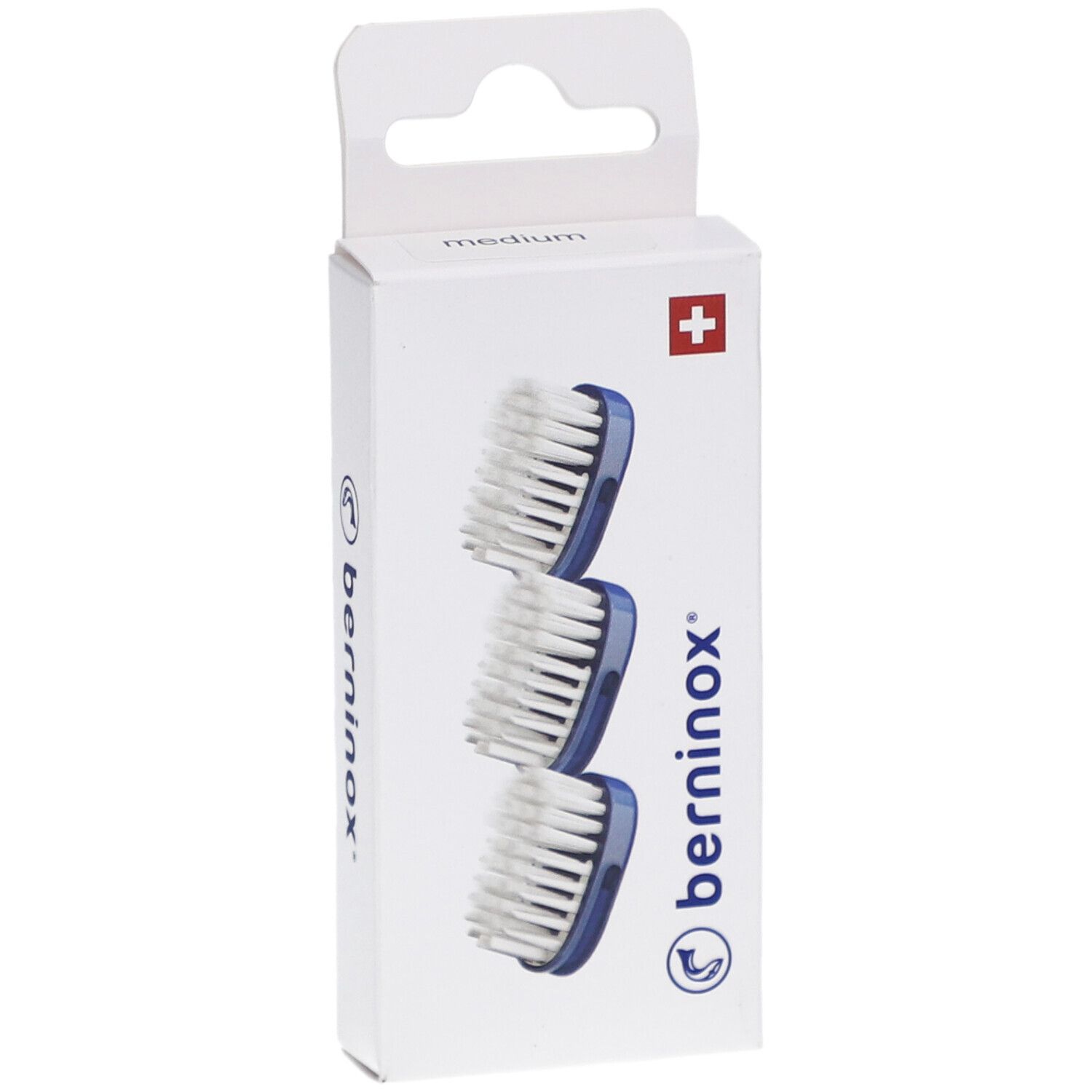 Emballage de 3 têtes de brosse à dents. Support bleu, poils blancs. Marque Berninox, croix suisse.