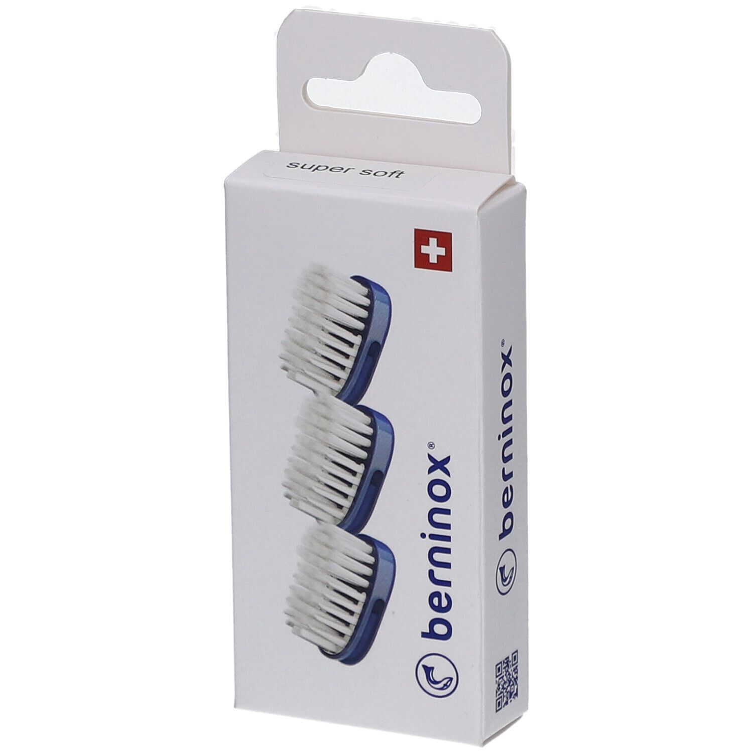 Boîte de 3 têtes de brosse à dents. Soies bleues, tête blanche. Croix suisse et logo.