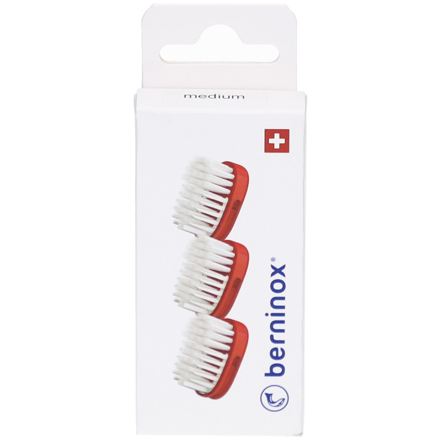 Trois têtes de brosse de remplacement, rouge corail, dans un emballage blanc avec croix suisse et logo.