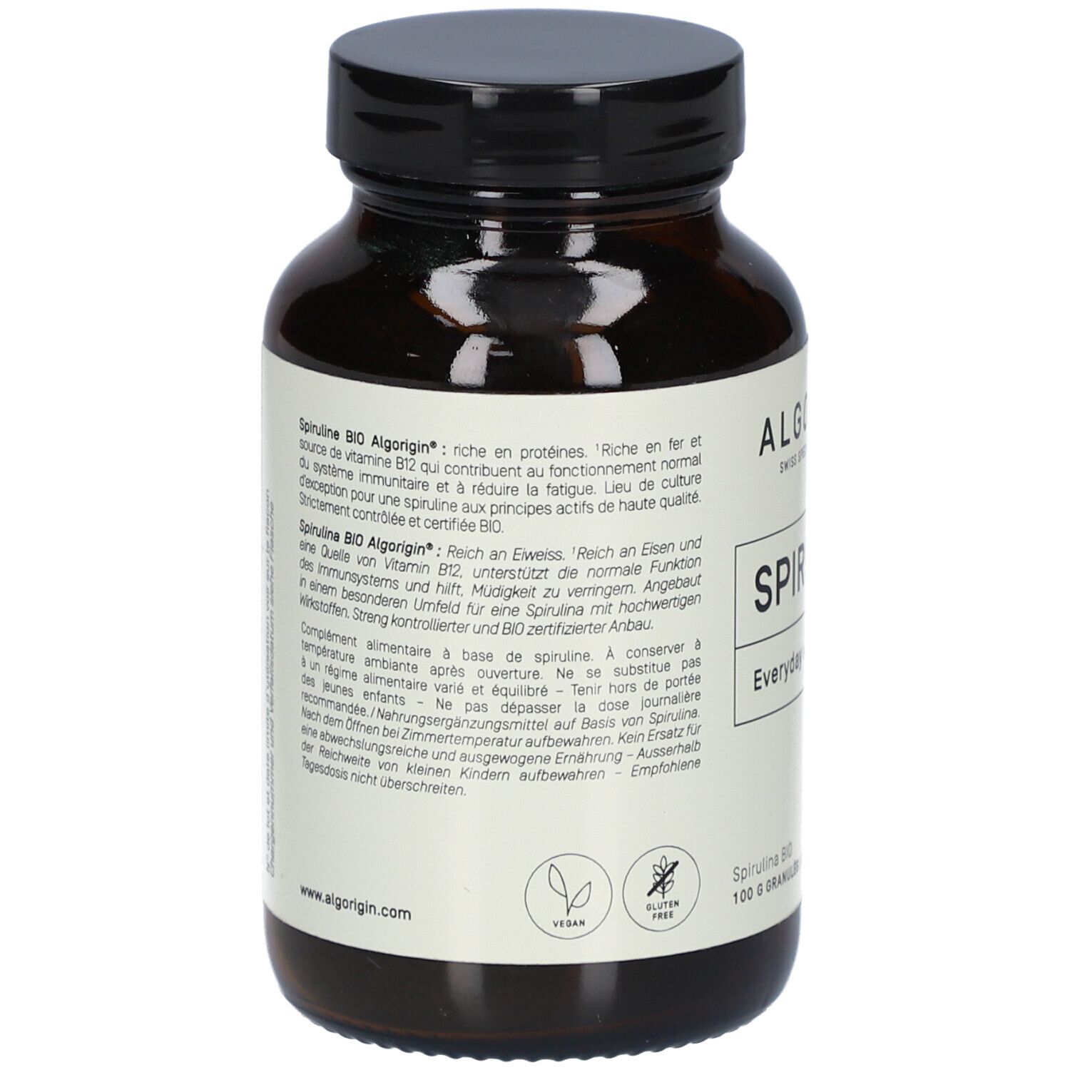 Rückseite der braunen Glasflasche. Text: Spirulina BIO Algorigin, reich an Proteinen, Vitaminen. Vegan und glutenfrei.