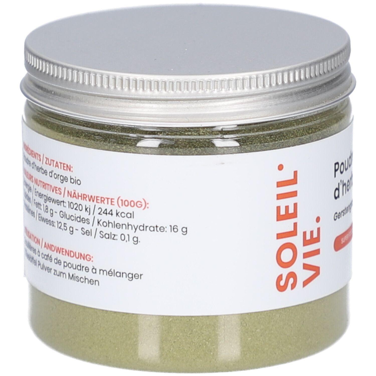 Pot en verre avec poudre verte. Inscriptions: Ingrédients, valeurs nutritionnelles. Marque: Soleil Vie. Texte en français et allemand.