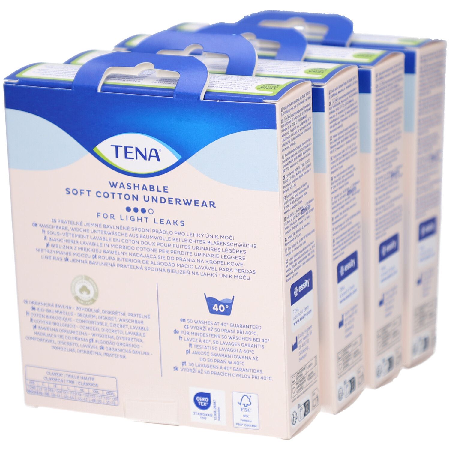 Rückseite von vier Packungen TENA Unterwäsche. Text in mehreren Sprachen. Waschsymbole.
